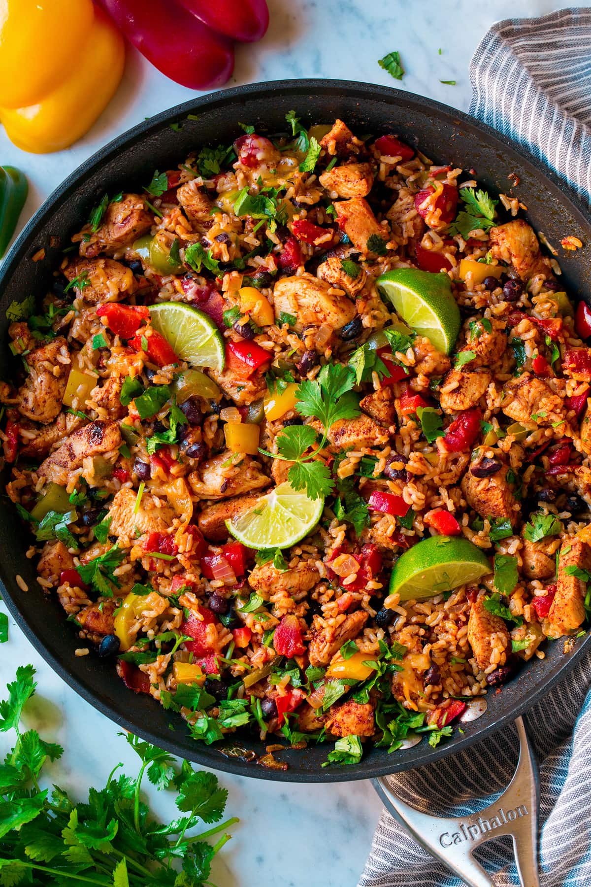 Chicken Fajita Rice Bowl Chicken Fajita Rice Bowl shown after cooking in one pan. It includes brown rice, chicken, black beans and bell peppers.