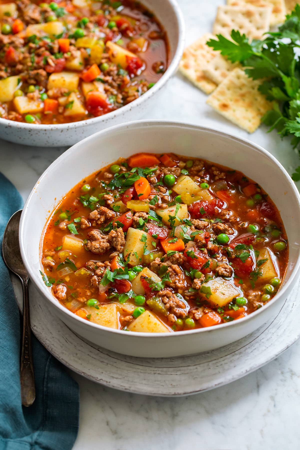 Hamburger Soup two servings of hamburger soup in white serving bowls