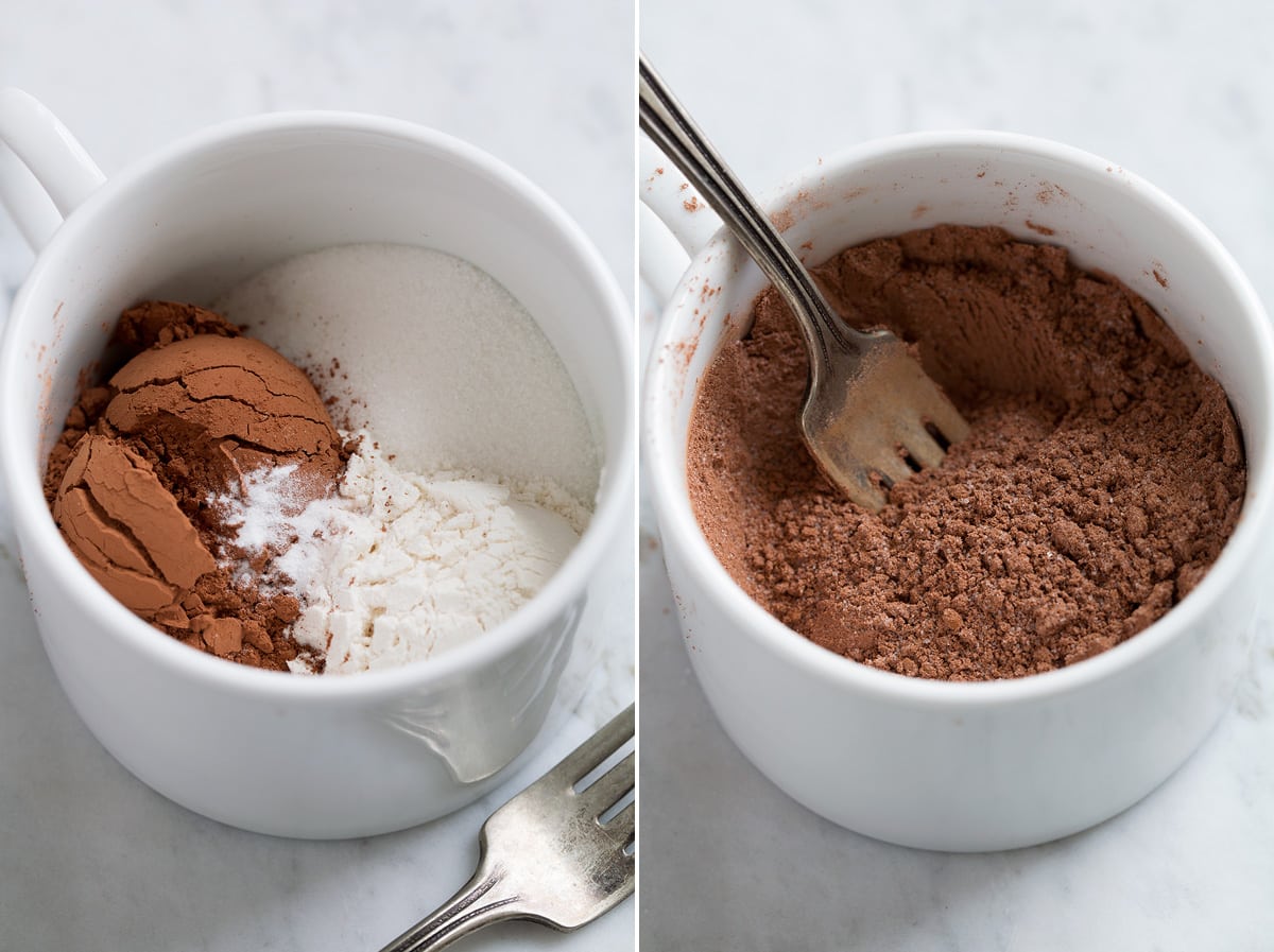 Chocolate Mug Cake First step of making mug cake shown, whisking dry ingredients in mug.