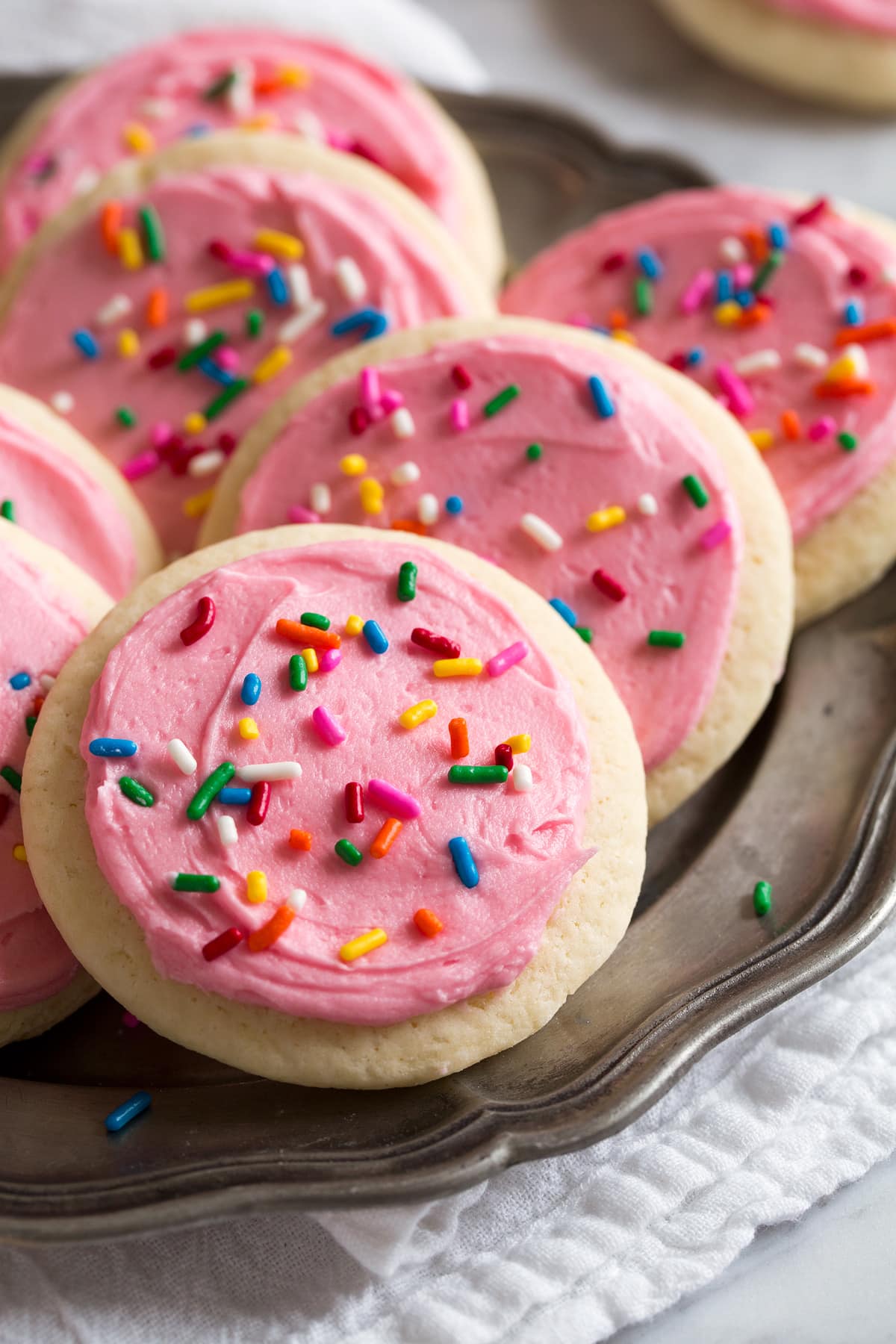 Soft Frosted Sugar Cookies Lofthouse style cutout frosted sugar cookies close up image.