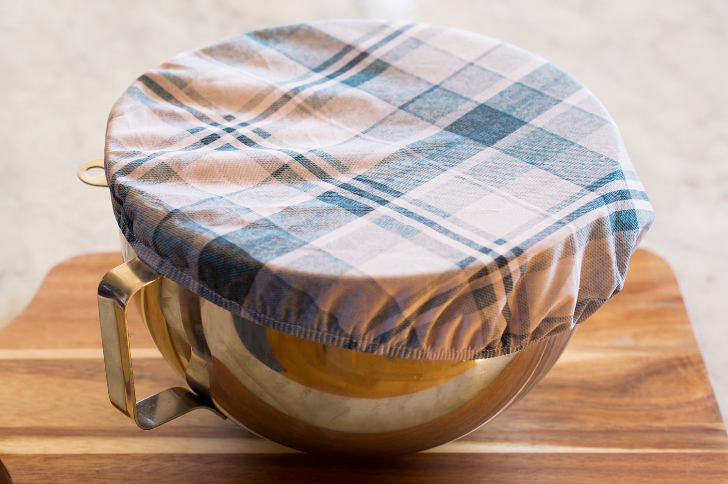 One Hour Dinner Rolls Mixing bowl with cover over top.