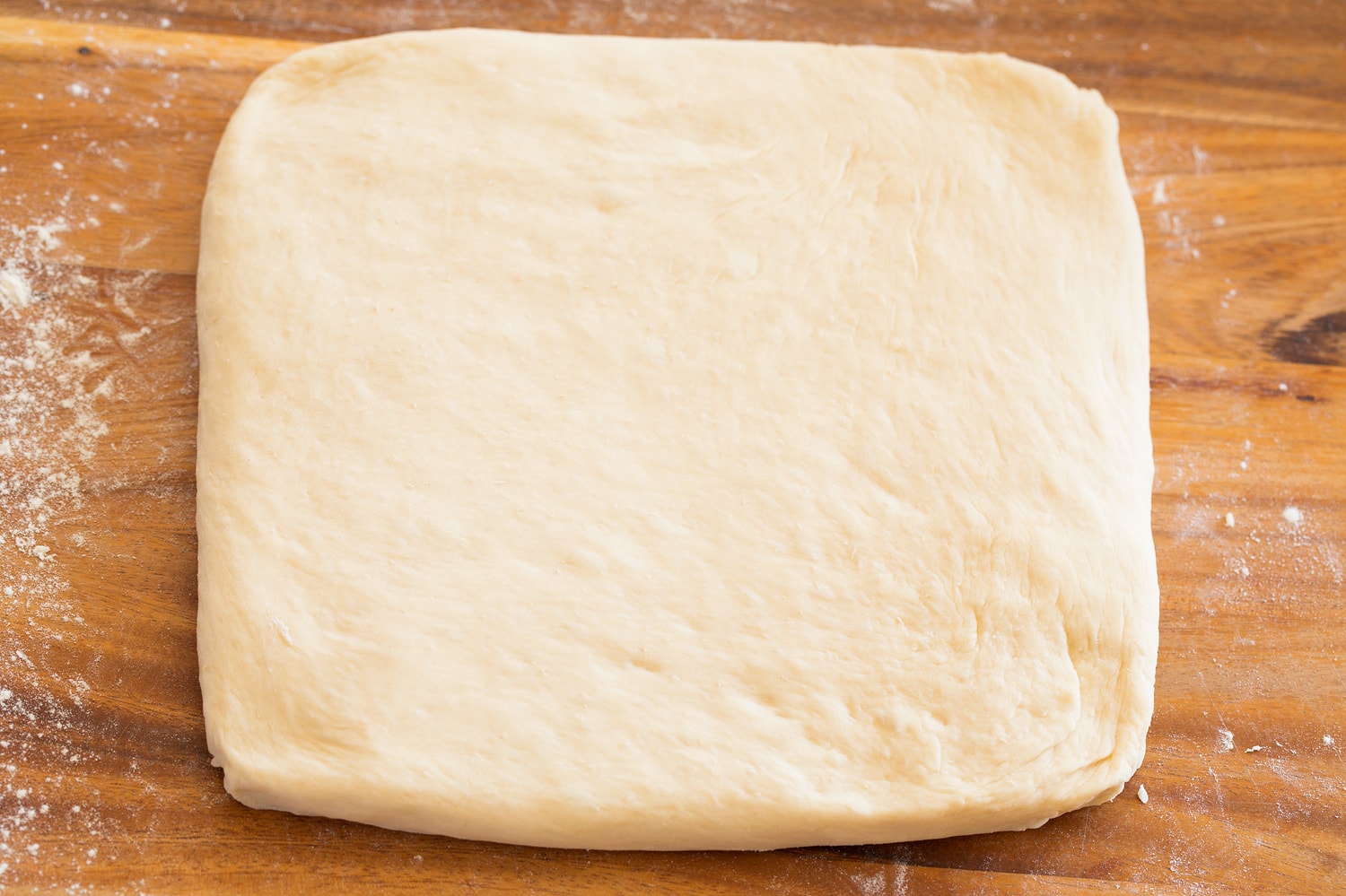 One Hour Dinner Rolls Rolled out quare dough.