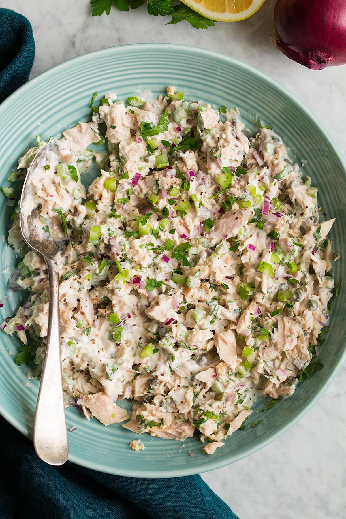 Tuna Salad Tuna salad shown close up to show mix-in ingredients and texture.