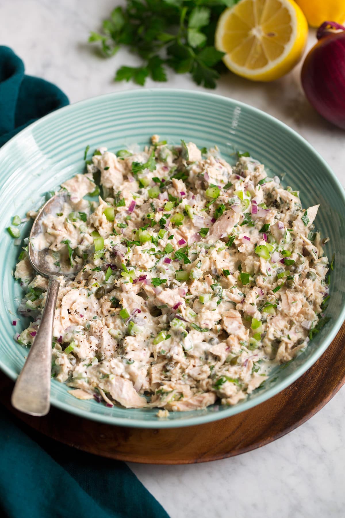 Tuna Salad Tuna salad in a turquoise serving bowl.