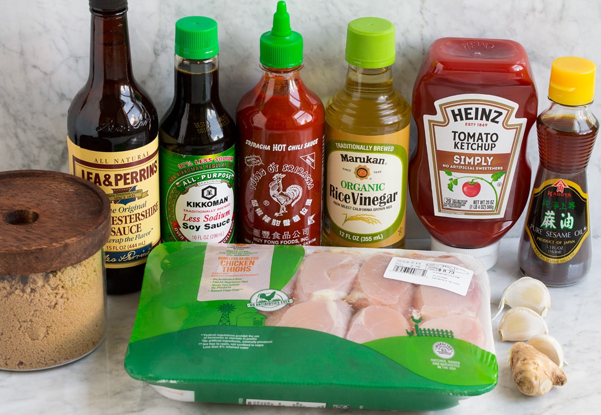 Huli Huli Chicken Image of ingredients used to make hawaiian huli huli chicken. Includes chicken thighs, brown sugar, Worcestershire sauce, soy sauce, sriracha, rice vinegar, ketchup, sesame oil, ginger and garlic.