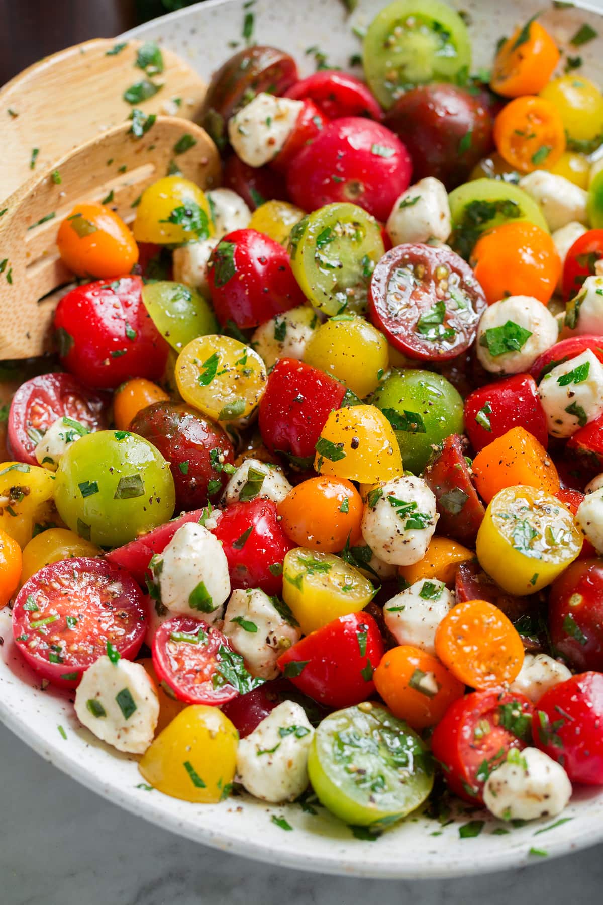 Tomato Salad Image showing tomato salad from a side angle in a serving bowl.