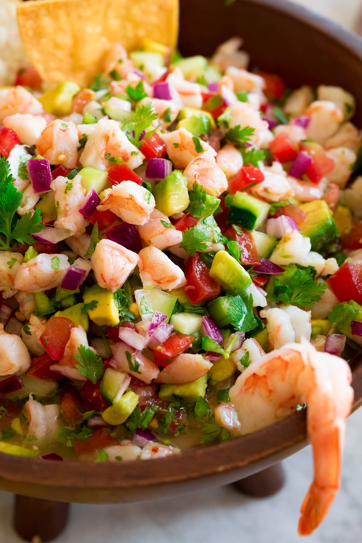 Ceviche Close up image of shrimp ceviche in a wooden bowl.