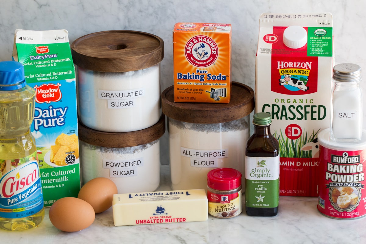 Baked Donuts Photo of ingredients used to make baked donuts. Includes vegetable oil, buttermilk, eggs, butter, flour, powdered sugar, granulated sugar, nutmeg, vanilla extract, baking soda, baking powder, salt and milk.