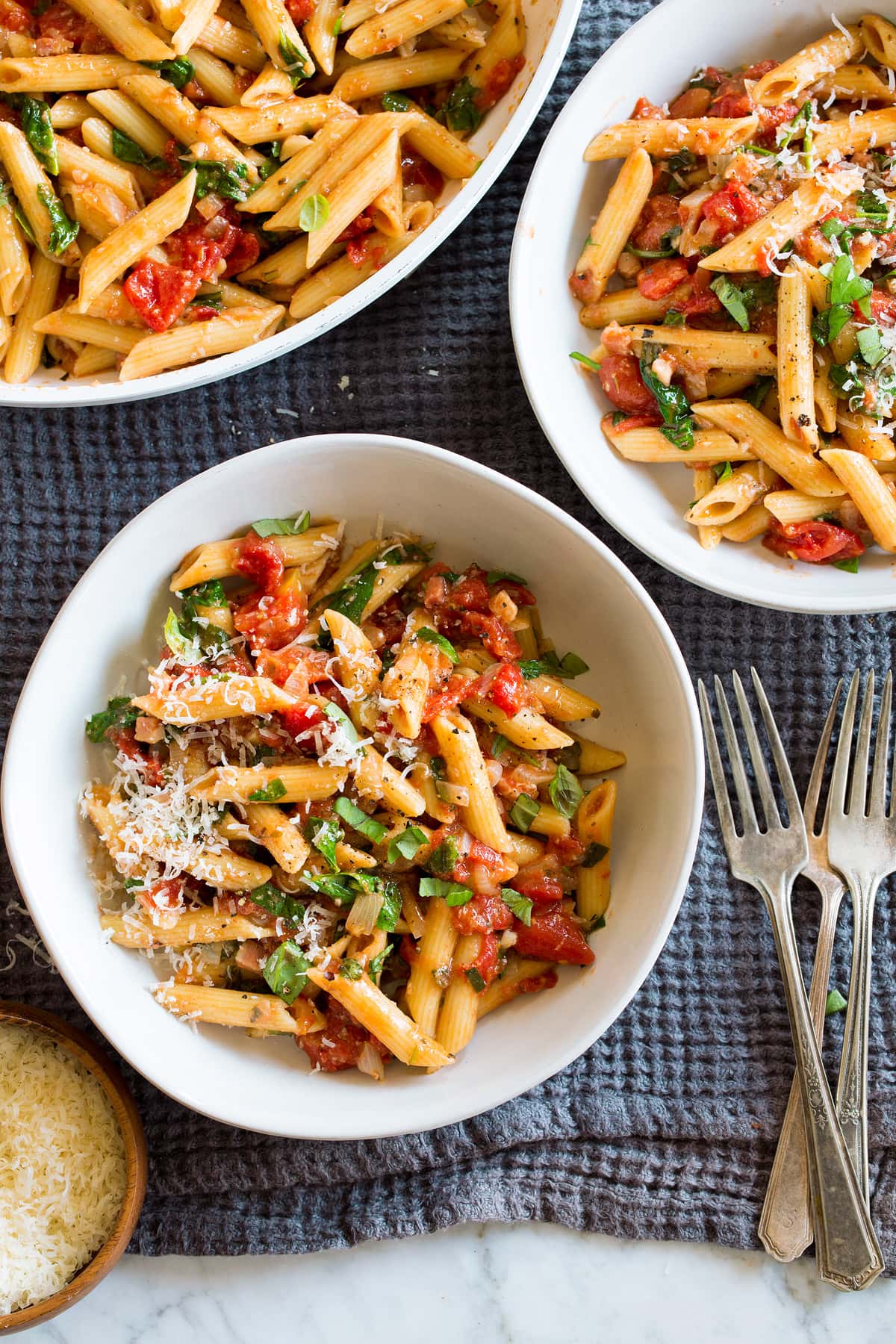 One Pot Pasta One Pot Tomato Basil Pasta shown in individual serving bowls.