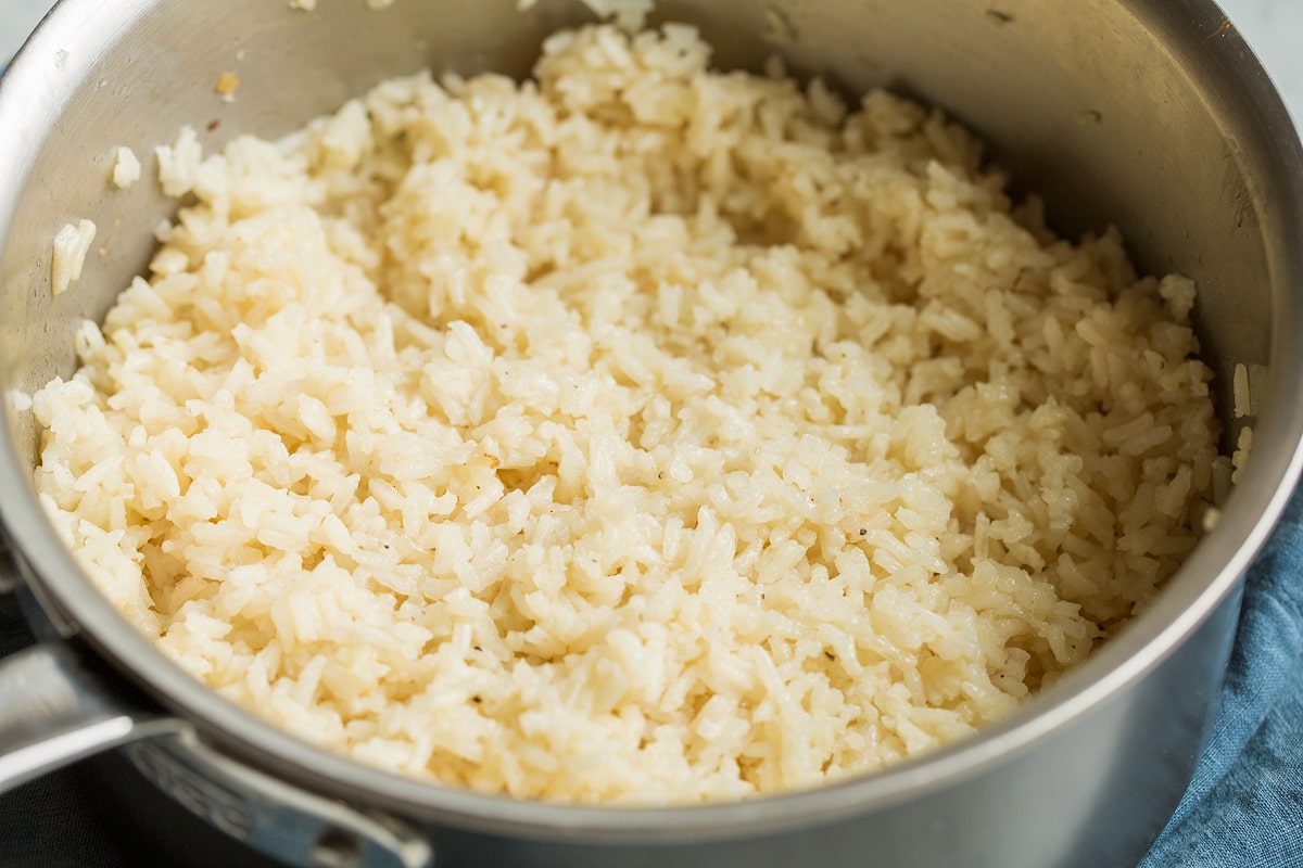 Garlic Butter Rice Garlic butter rice shown in a skillet after cooking.
