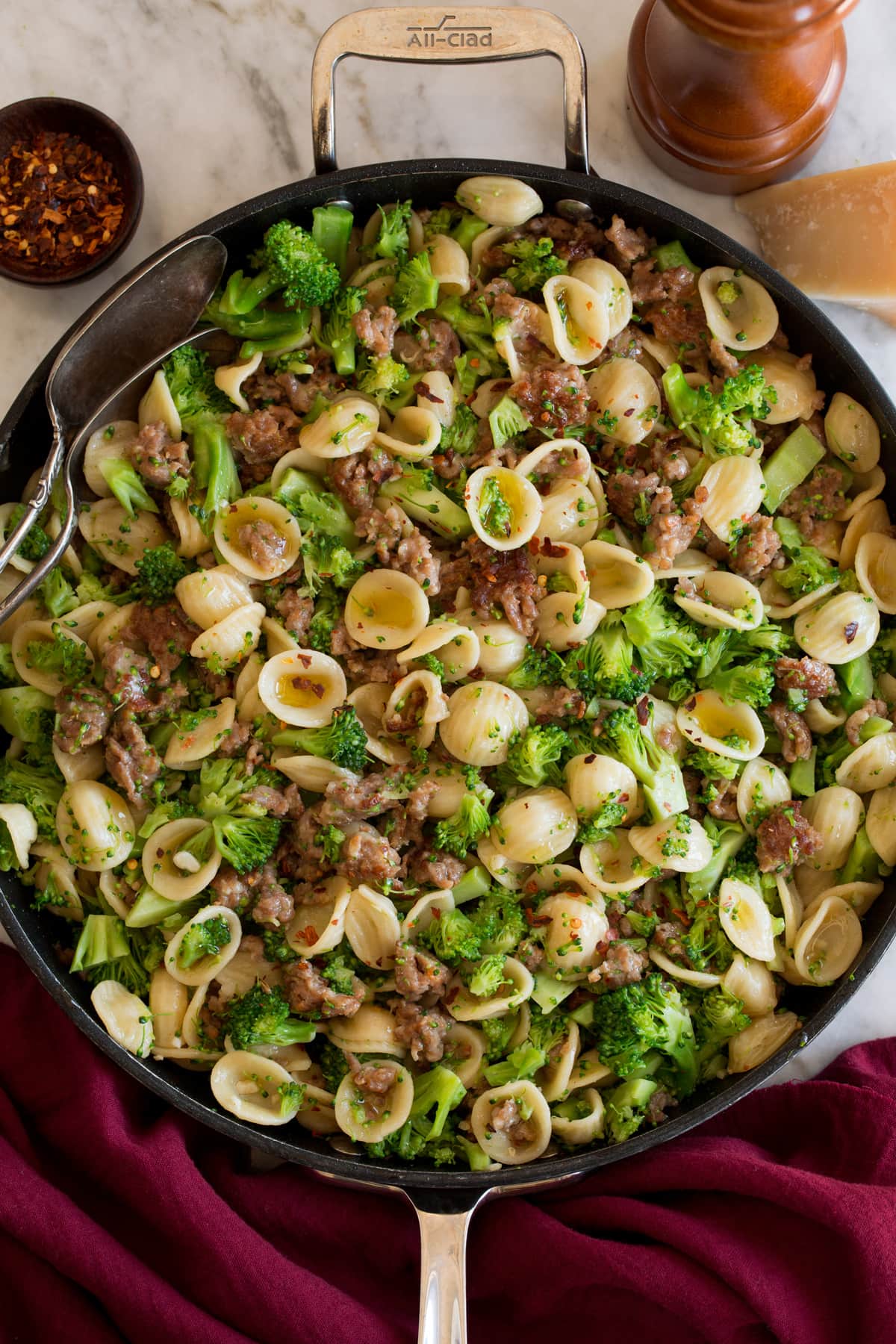 Orecchiette with Sausage and Broccoli Photo: Orecchiette with sausage and broccoli shown in a black skillet from above.