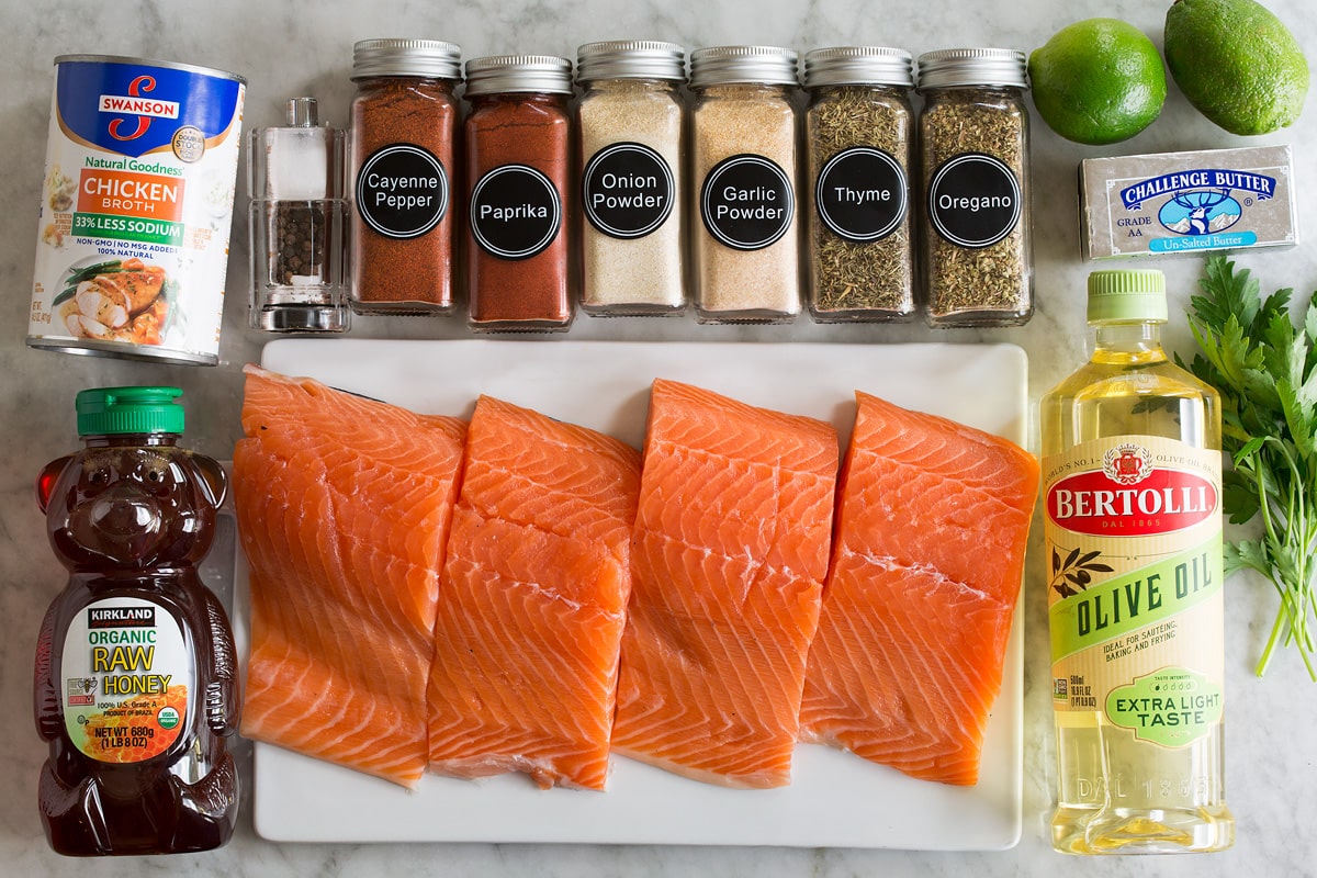Blackened Salmon Image of ingredients used to make blackened salmon shown overhead on a marble surface.
