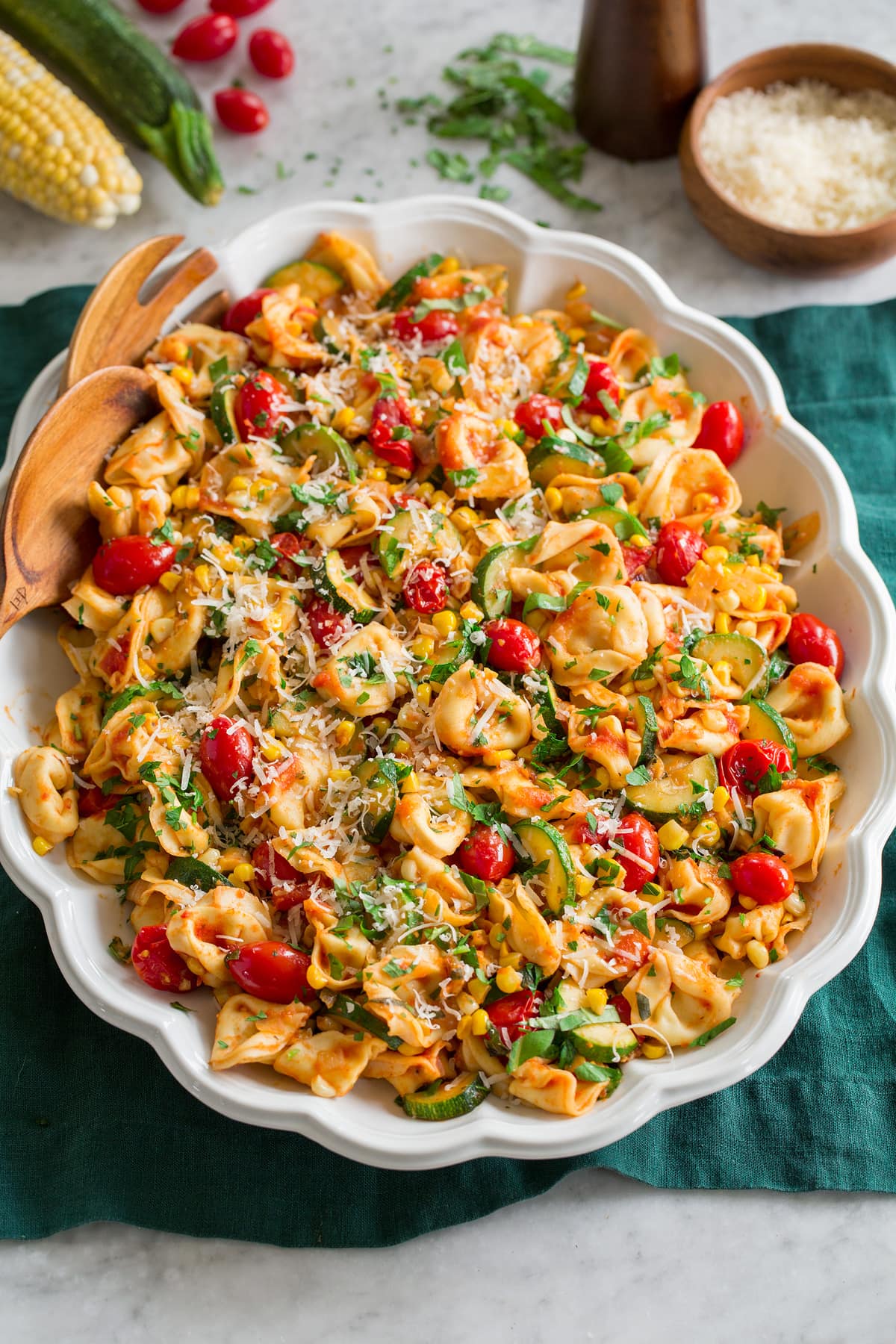 Cheese Tortellini with Summer Veggies Photo: A tortellini recipe shown in a serving dish from a side angle.