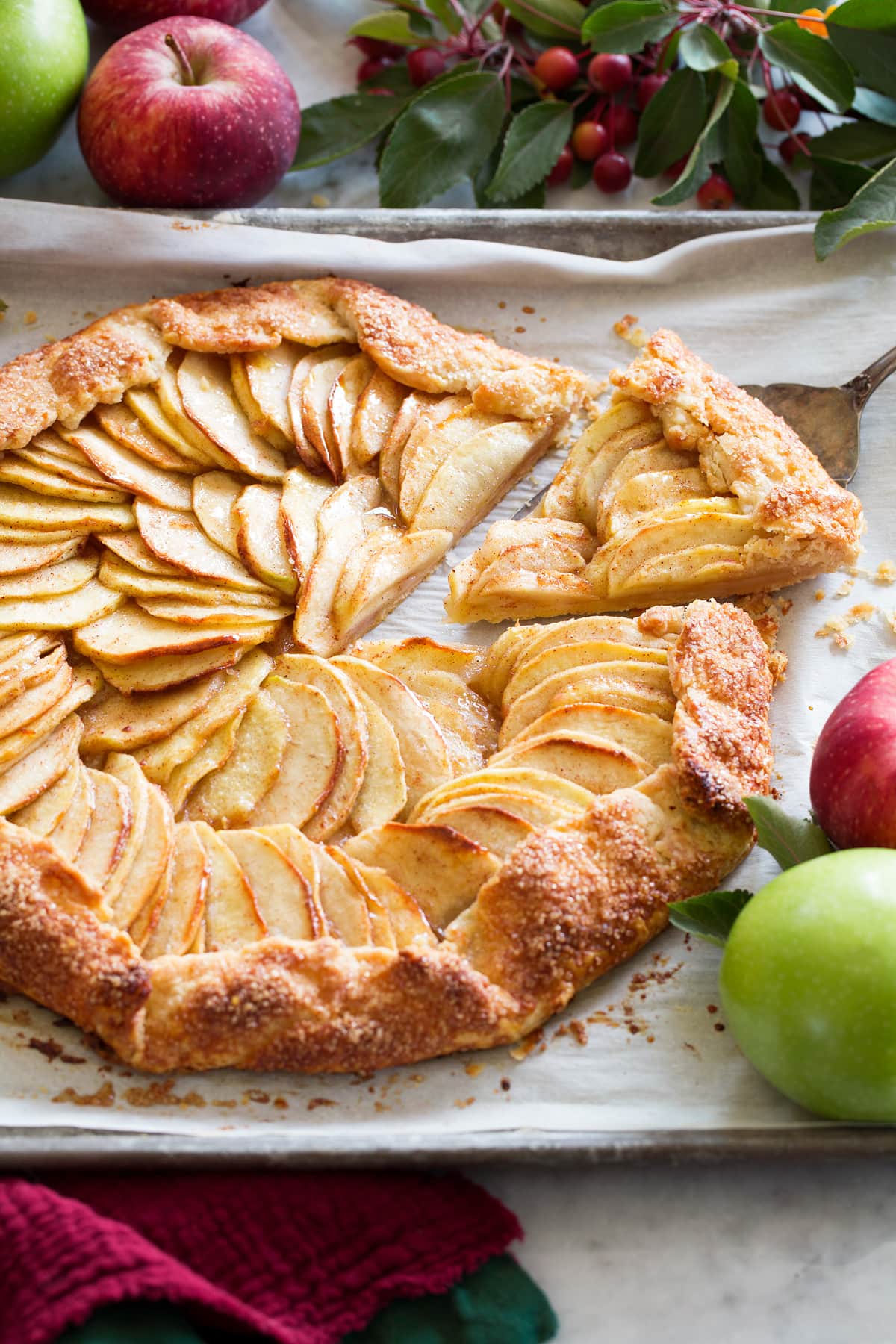 Apple Galette Apple galette with a slice being removed.