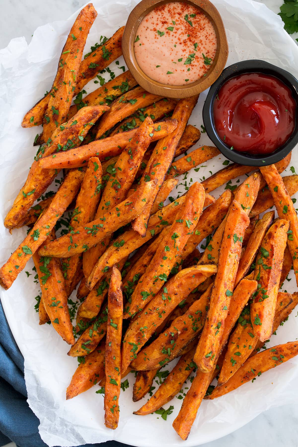Baked Sweet Potato Fries Close up photo of sweet potato fries.