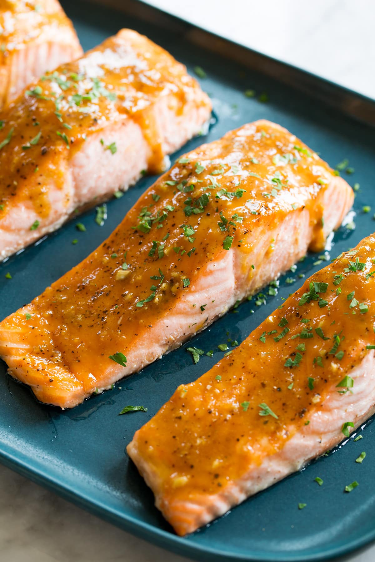 Brown Sugar Glazed Salmon Close up photo of glazed baked salmon fillet.