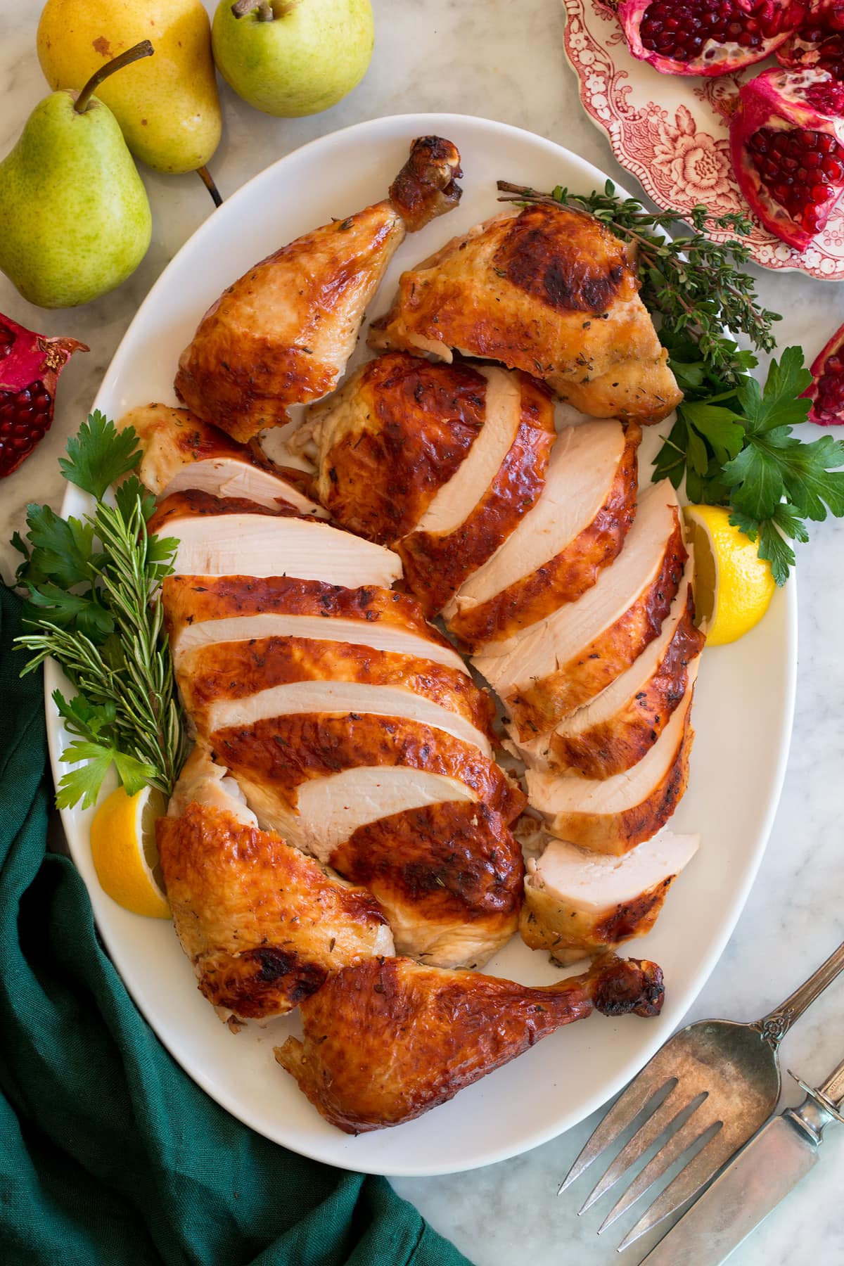 Buttermilk Roast Chicken Carved roast chicken shown on an oval serving platter.