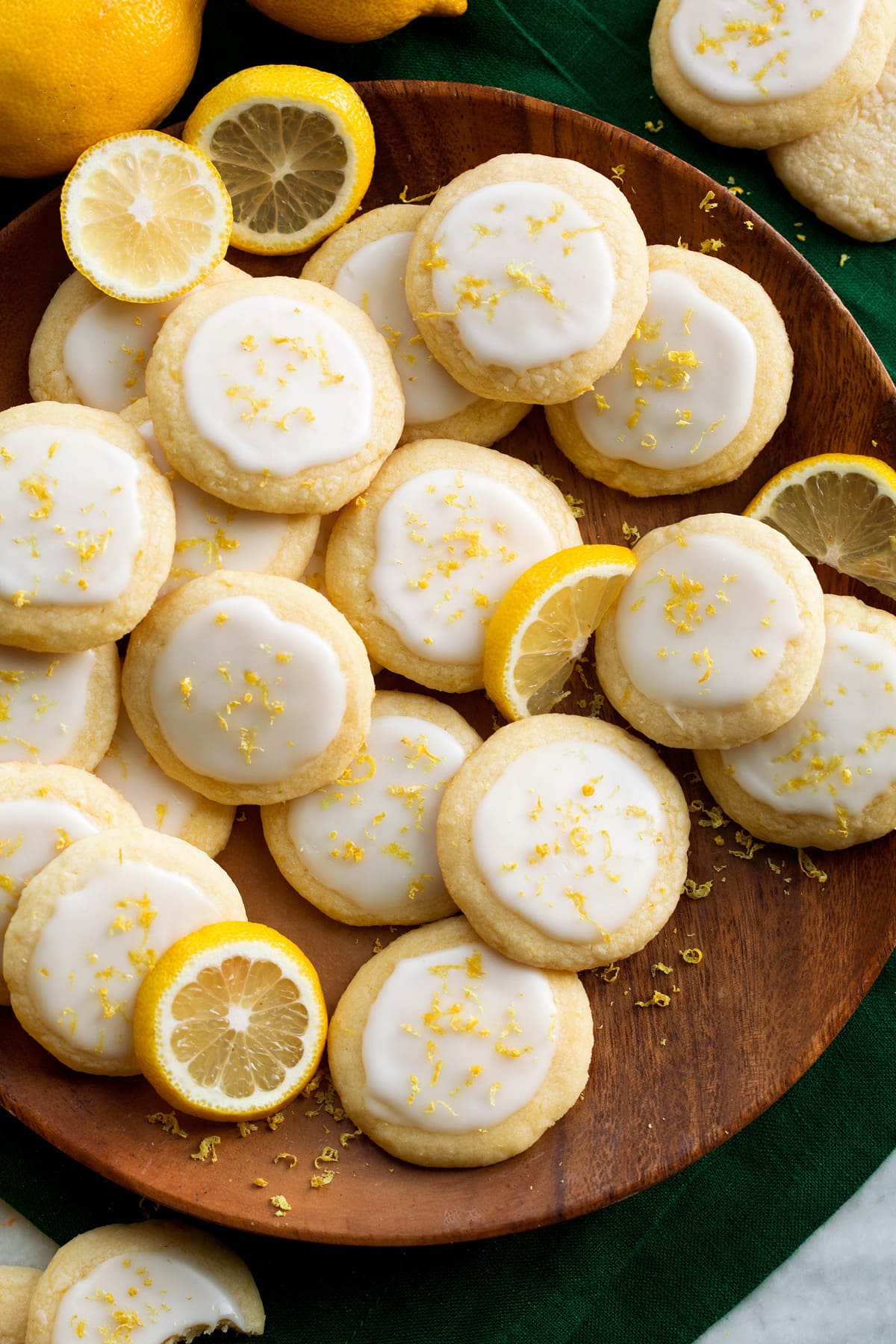Lemon Meltaway Cookies Overhead photo of lemon meltaway cookies on a wooden serving plate.