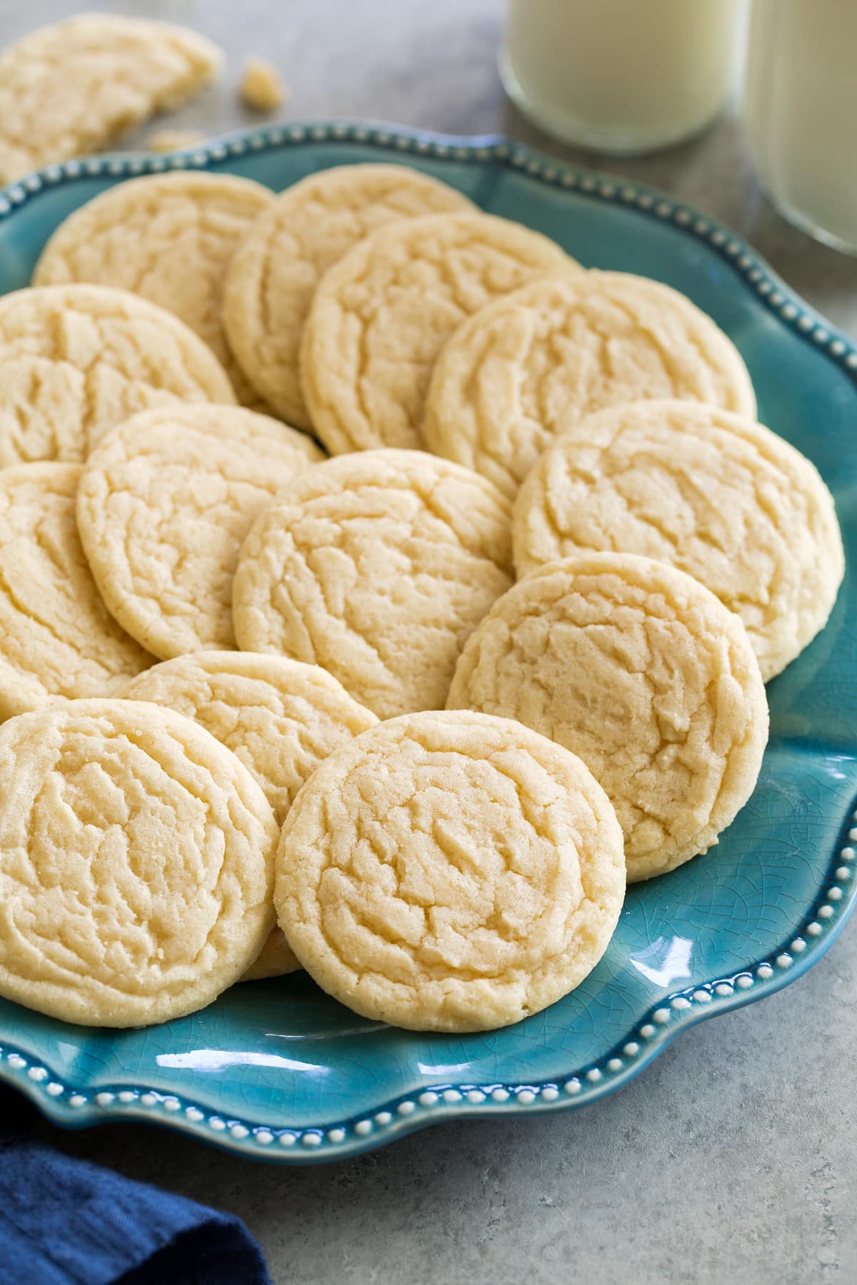 Sugar Cookies Classic homemade sugar cookies shown on a turquoise plate