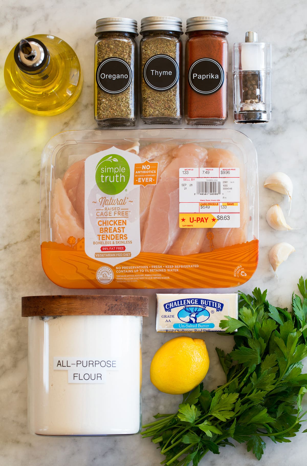 Lemon Butter Chicken Tenders Photo of ingredients used to make pan seared chicken tenders with lemon, garlic and butter.