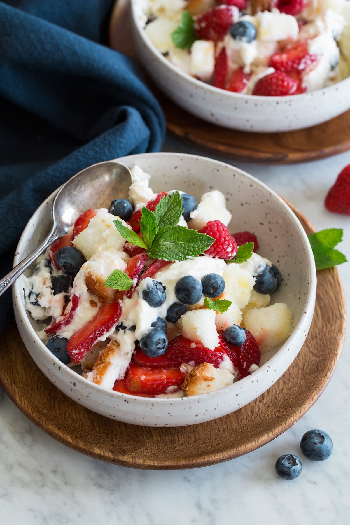 Trifle Trifle show in a single serving dish with a second serving in the background.