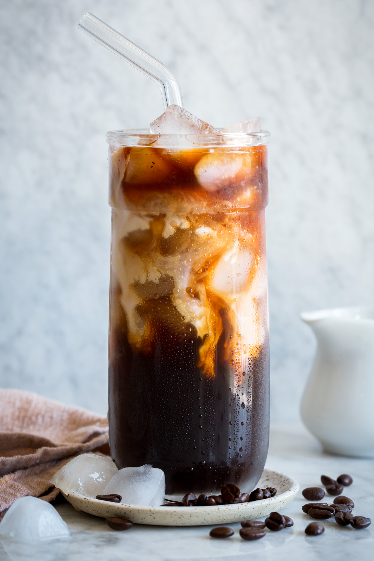 Iced Coffee Tall glass of iced coffee with cream.