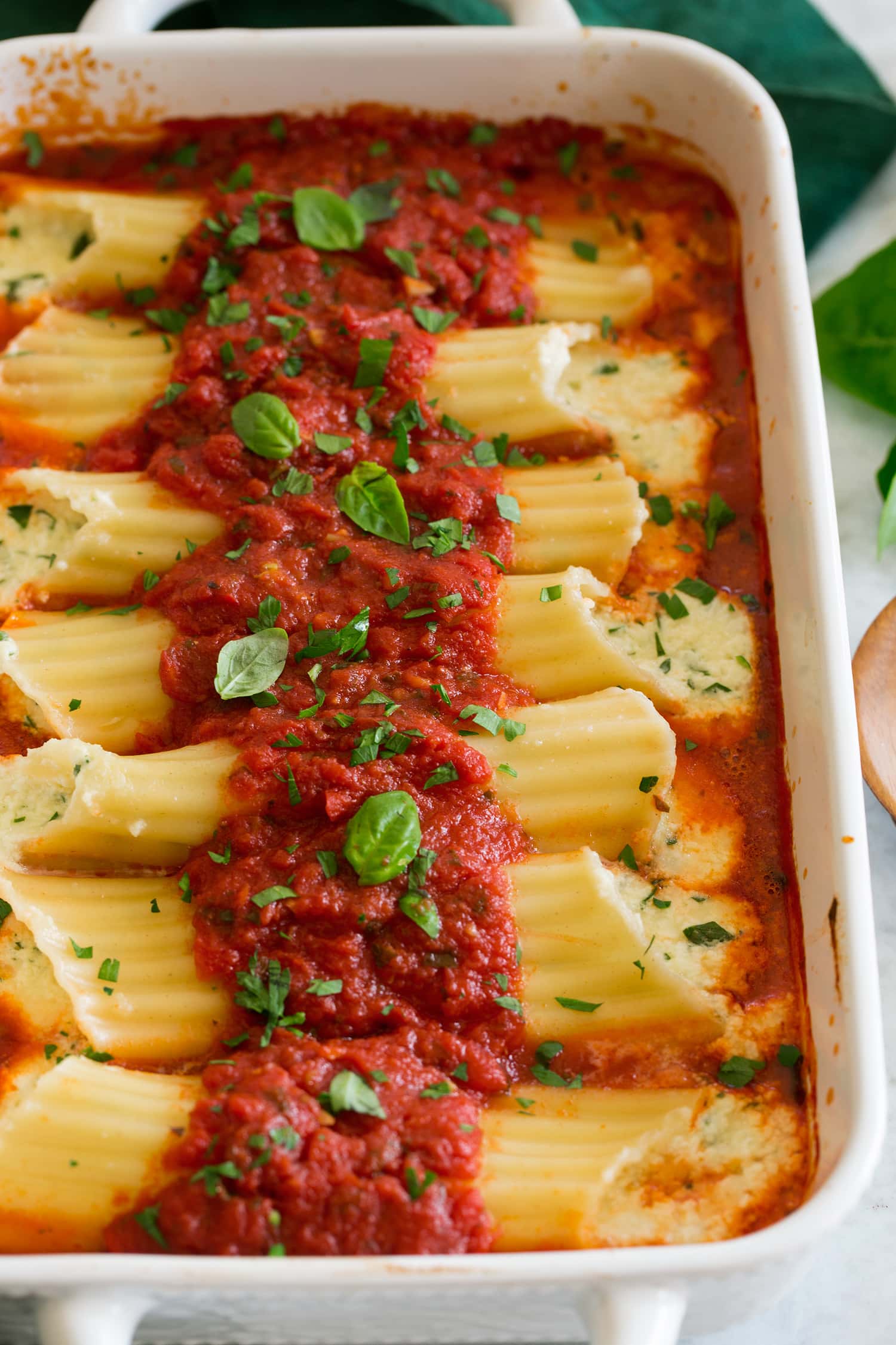 Manicotti Close up photo of Italian stuffed manicotti pasta.