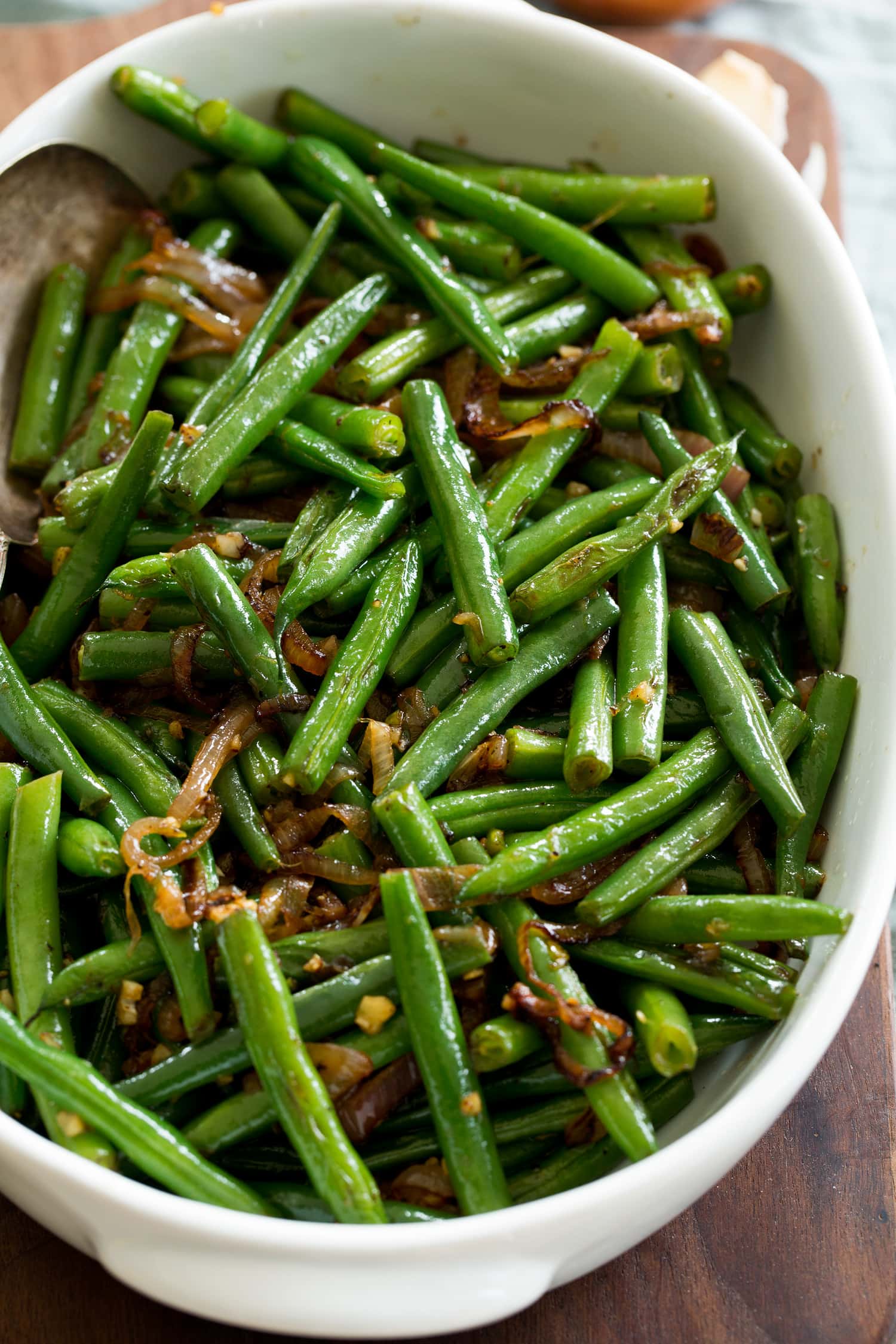 Sauteed Green Beans Close up photo of sauteed green beans with sauteed shallots.