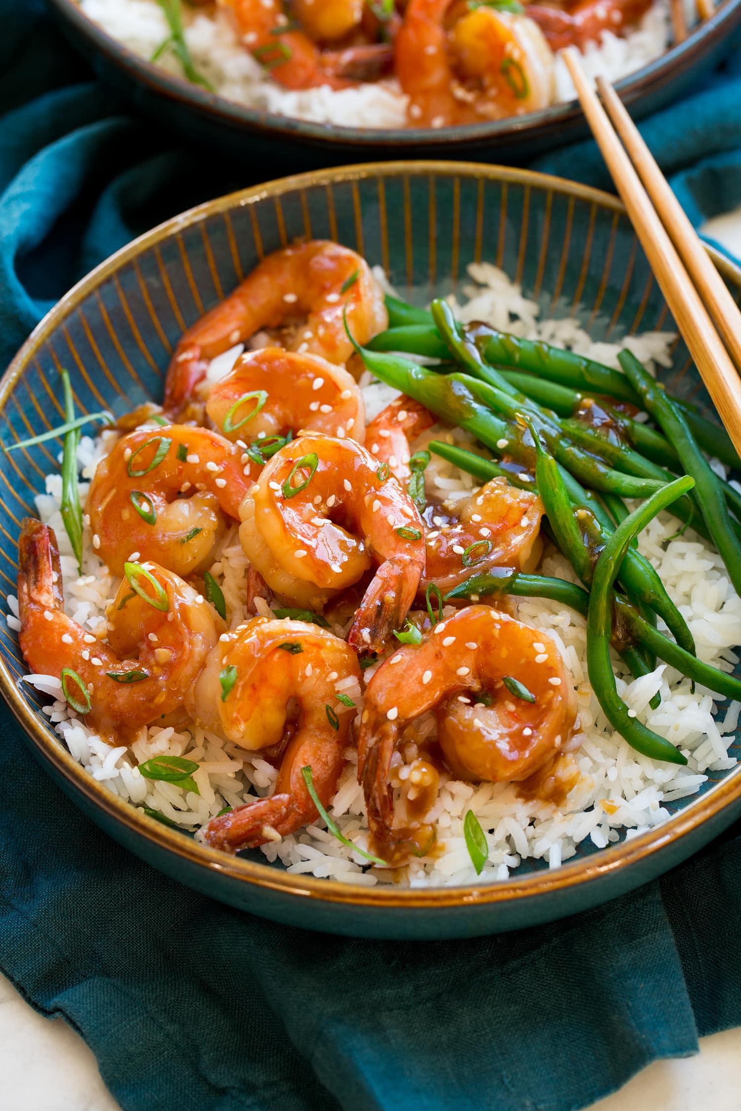 Teriyaki Shrimp Teriyaki shrimp served with a side of steamed rice and green beans.