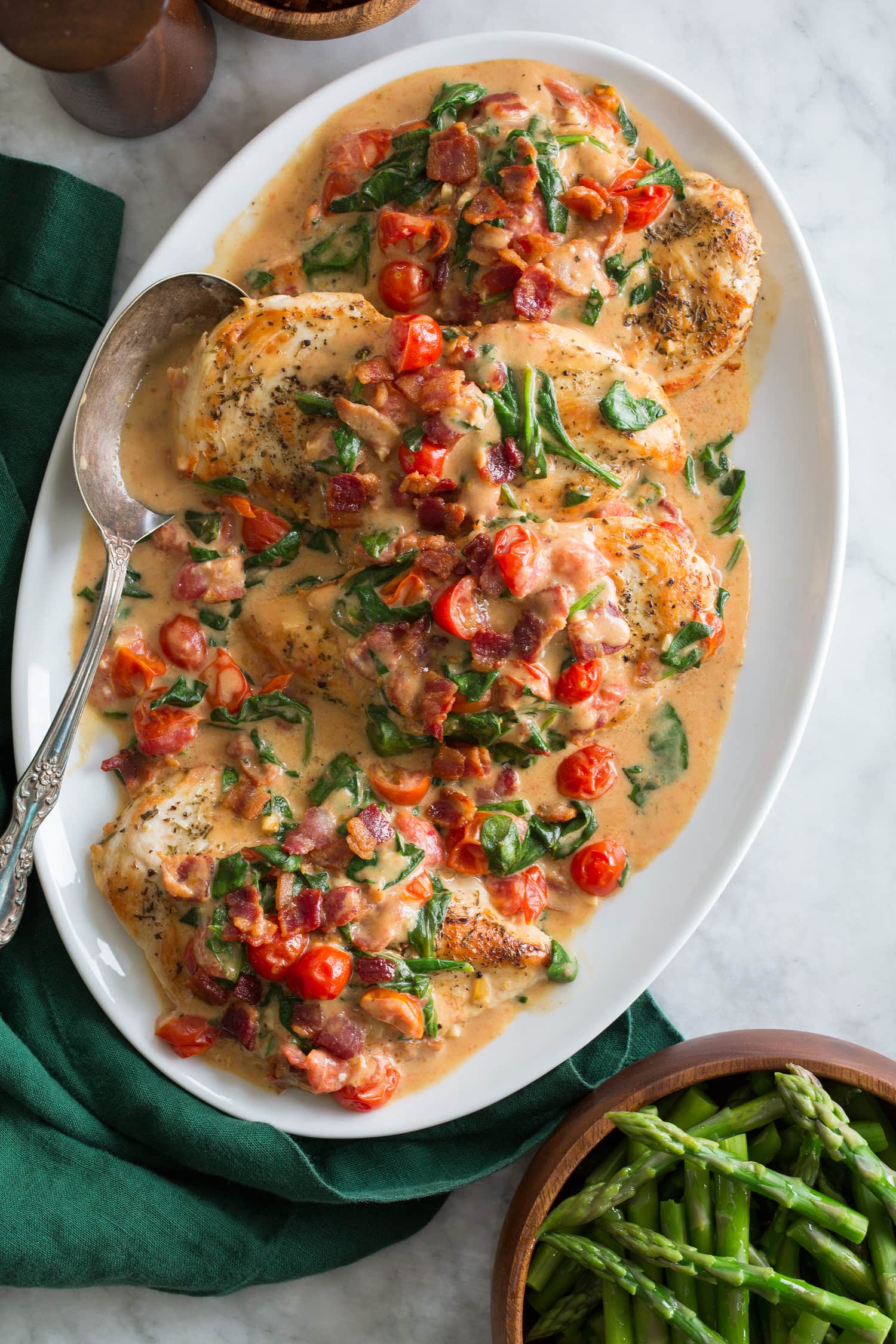 BLT Chicken Pan seared chicken with cream bacon tomato spinach sauce.