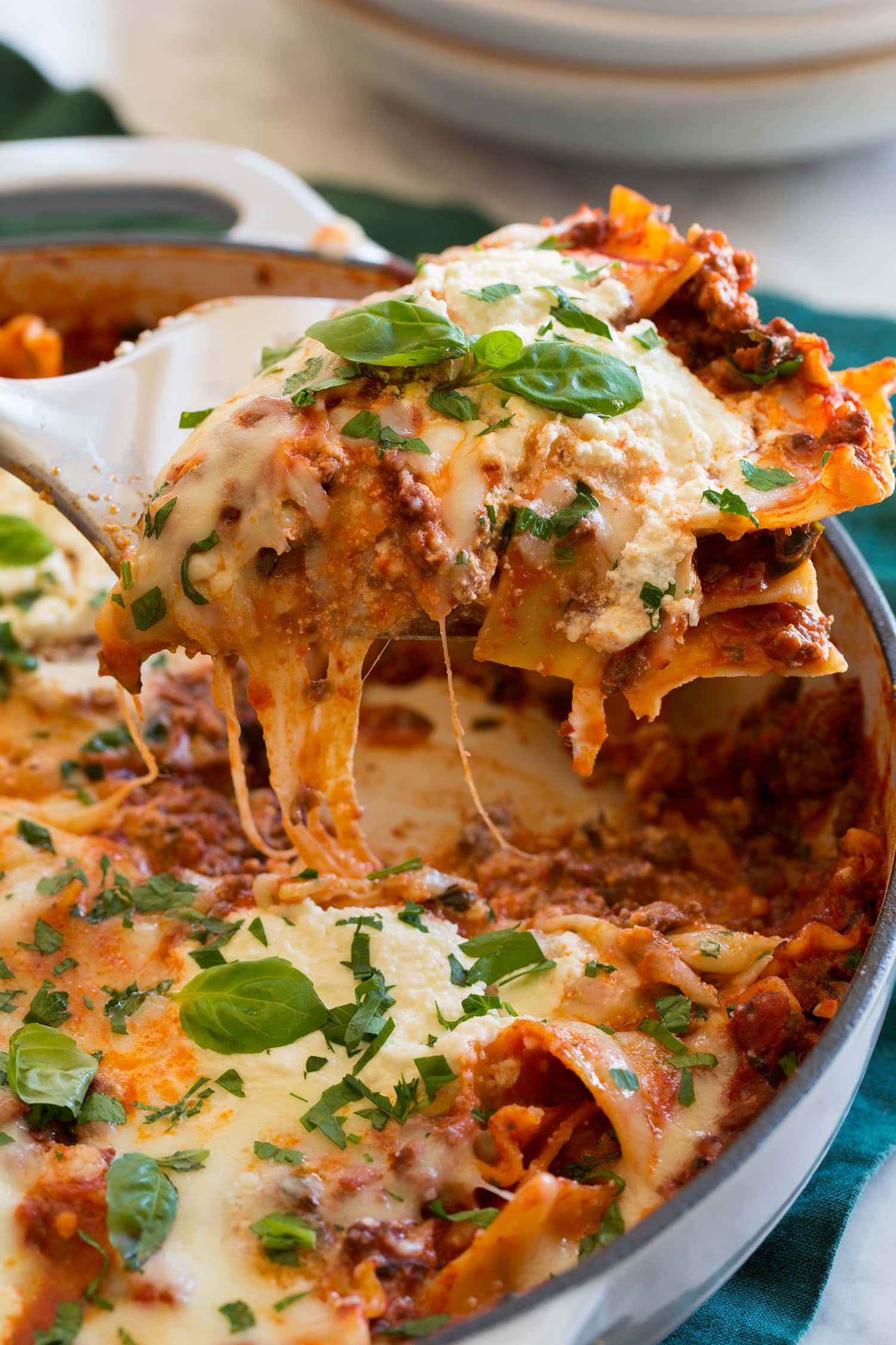 Skillet Lasagna One pot lasagna slice being scooped.