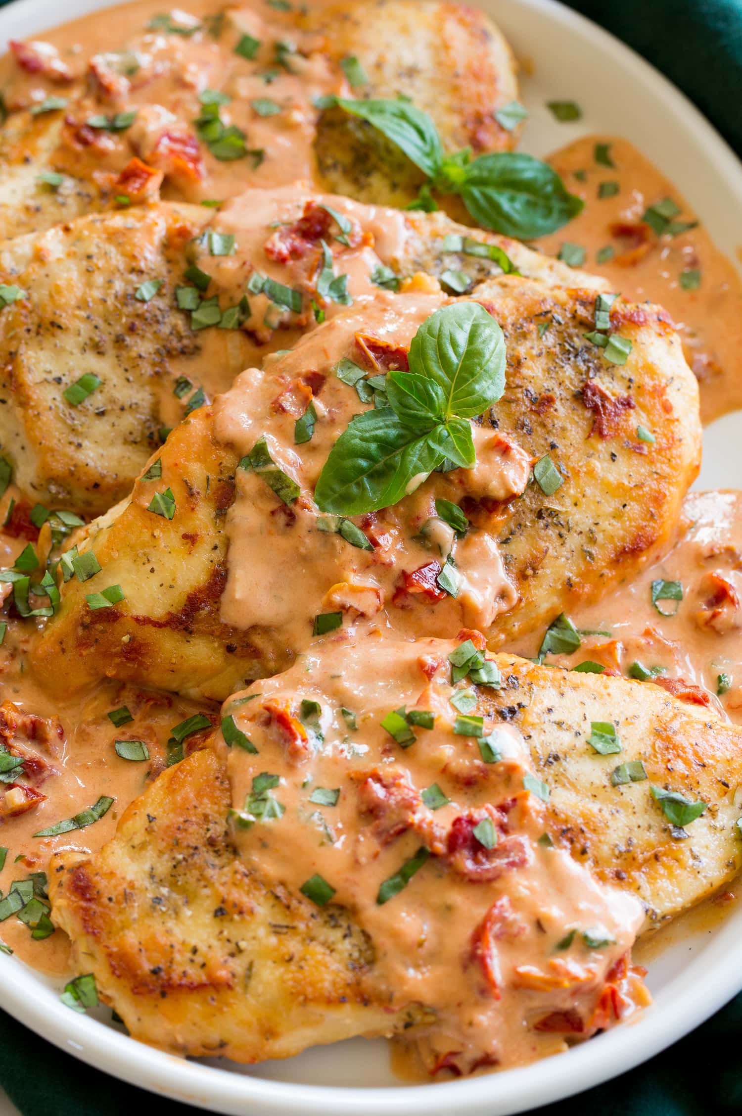Marry Me Chicken Close up photo of chicken with creamy sun dried tomato sauce.