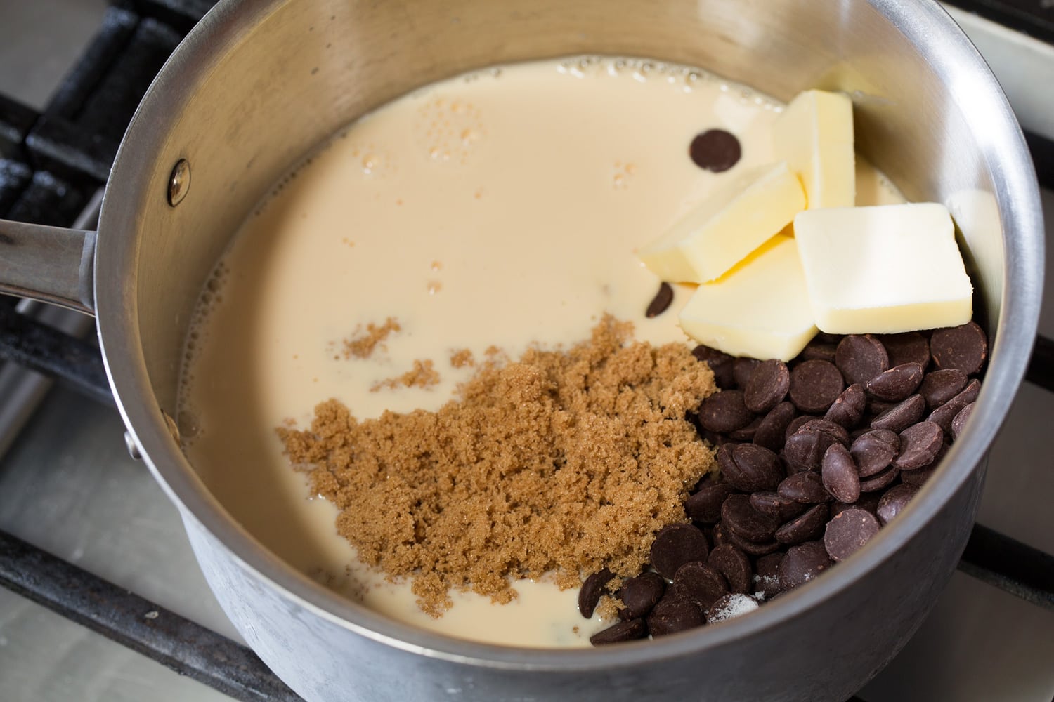 Hot Fudge Sauce Hot fudge ingredients in saucepan before mixing and cooking.