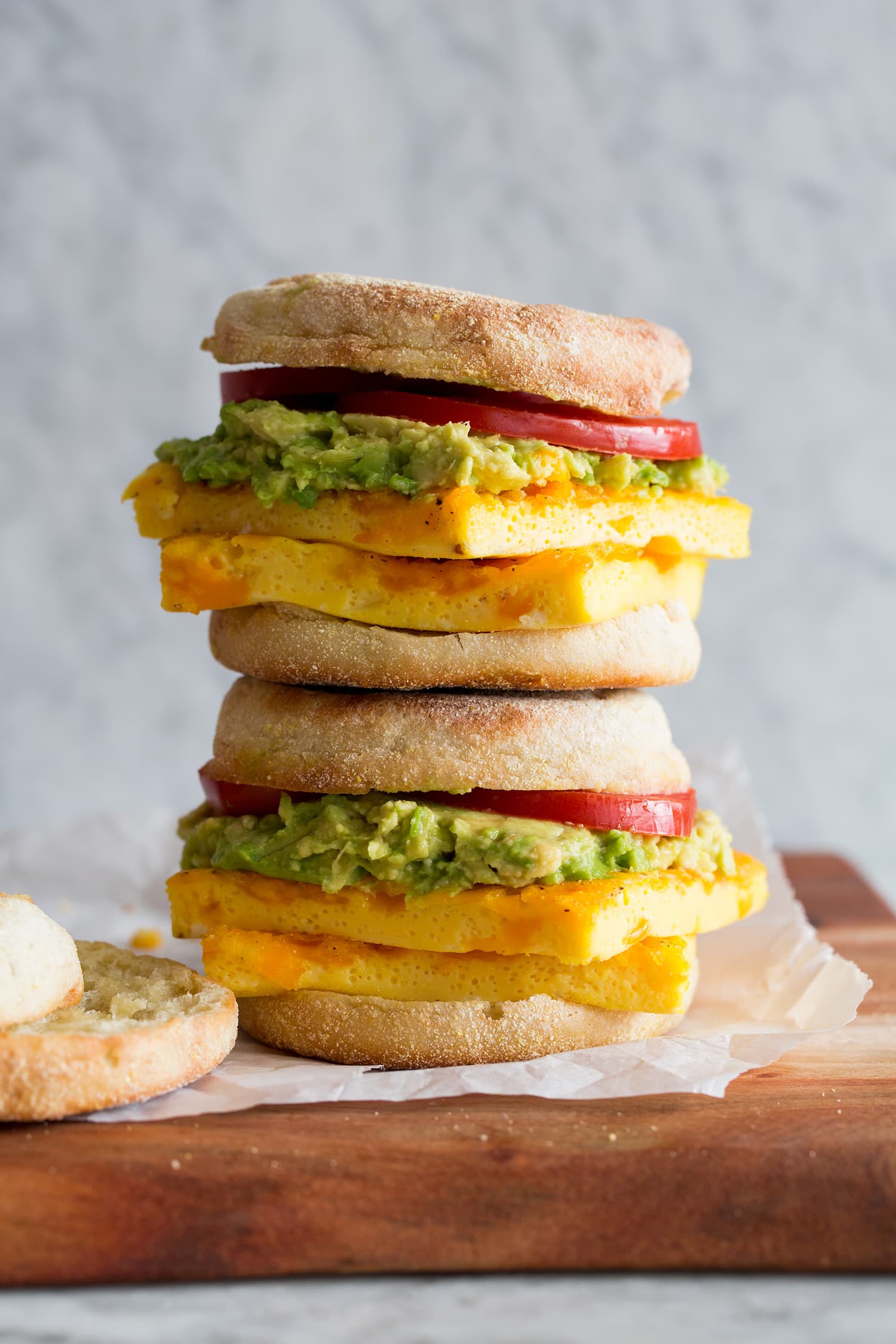 Sheet Pan Eggs English muffin with baked eggs.