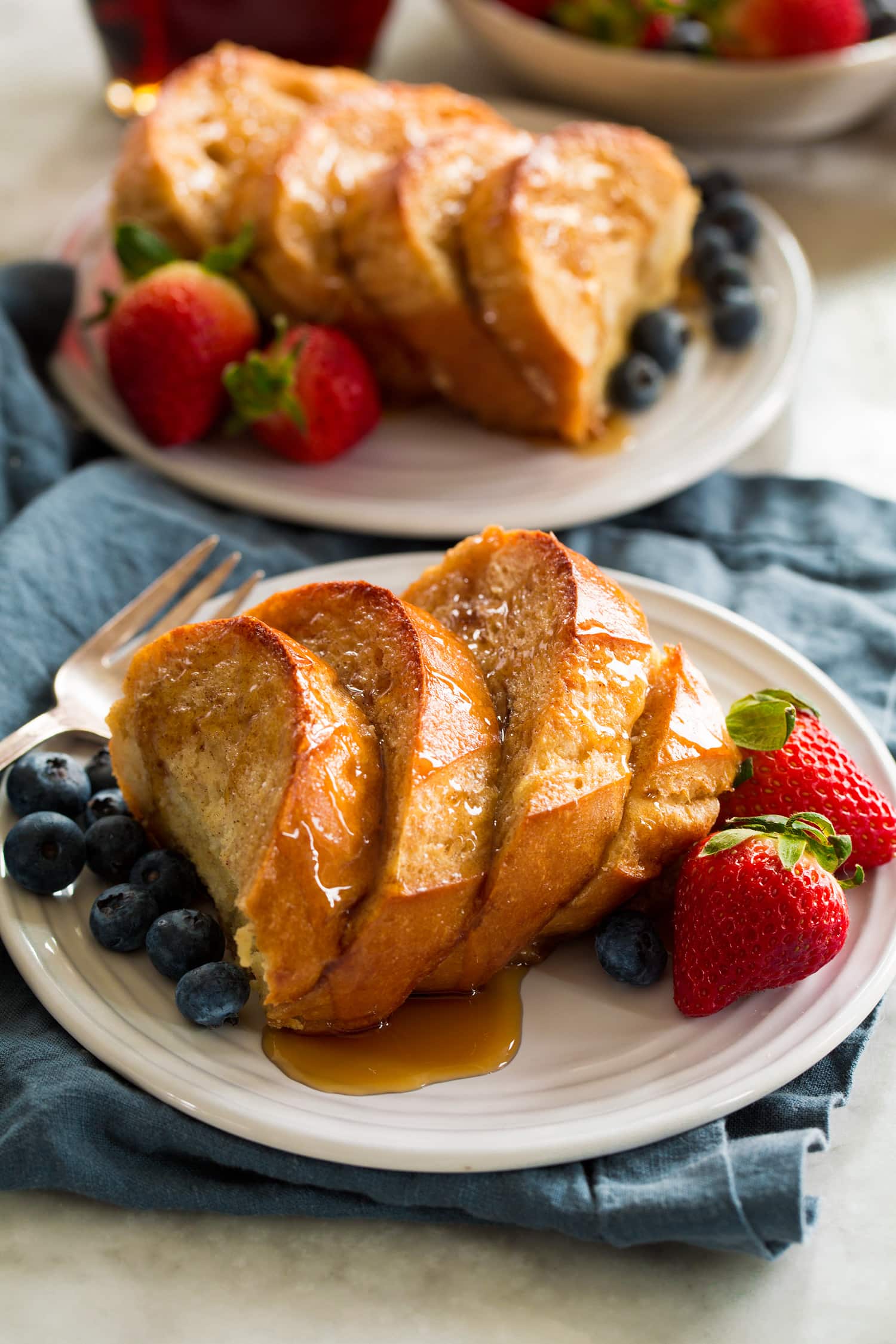 Baked French Toast Baked french toast cut into square servings.