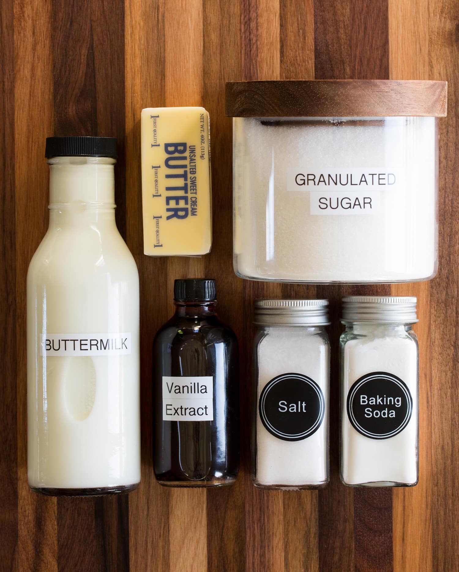 Buttermilk syrup Ingredients needed to make buttermilk syrup shown including sugar, buttermilk, baking soda, salt, vanilla and butter.