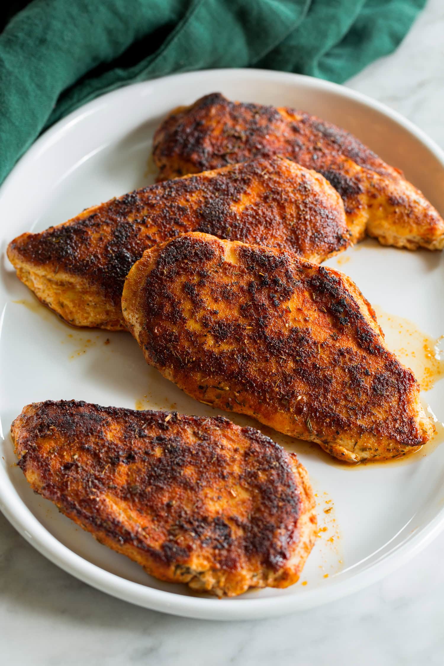 Blackened Chicken Four pieces of blackened chicken breasts plain.