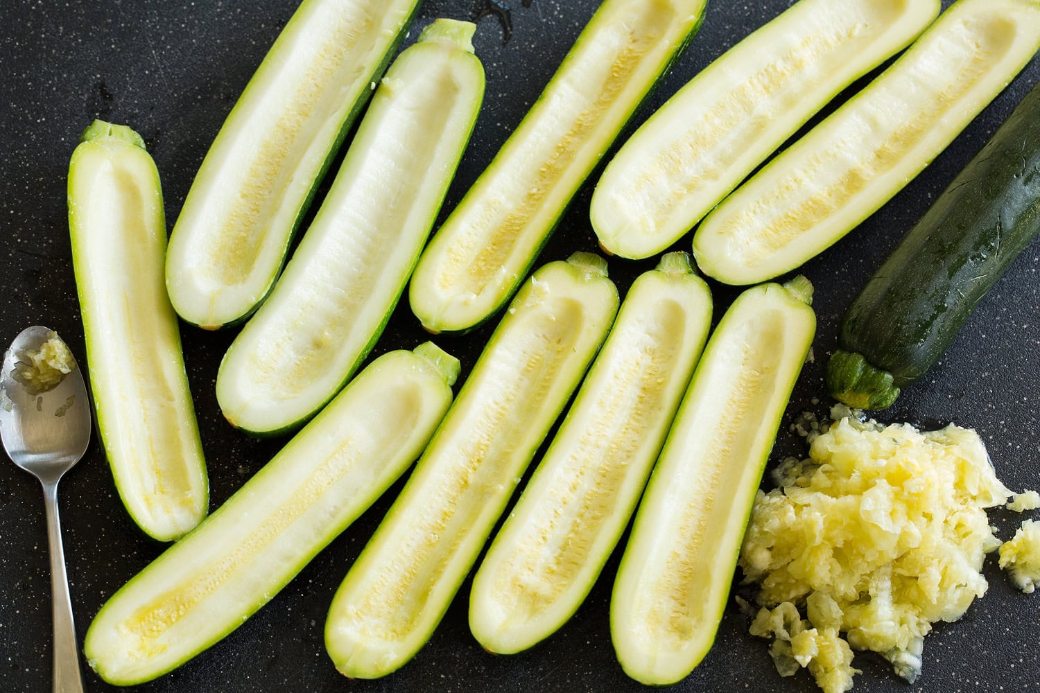 Zucchini Pizza Boats Zucchini boats with scooped out flesh.