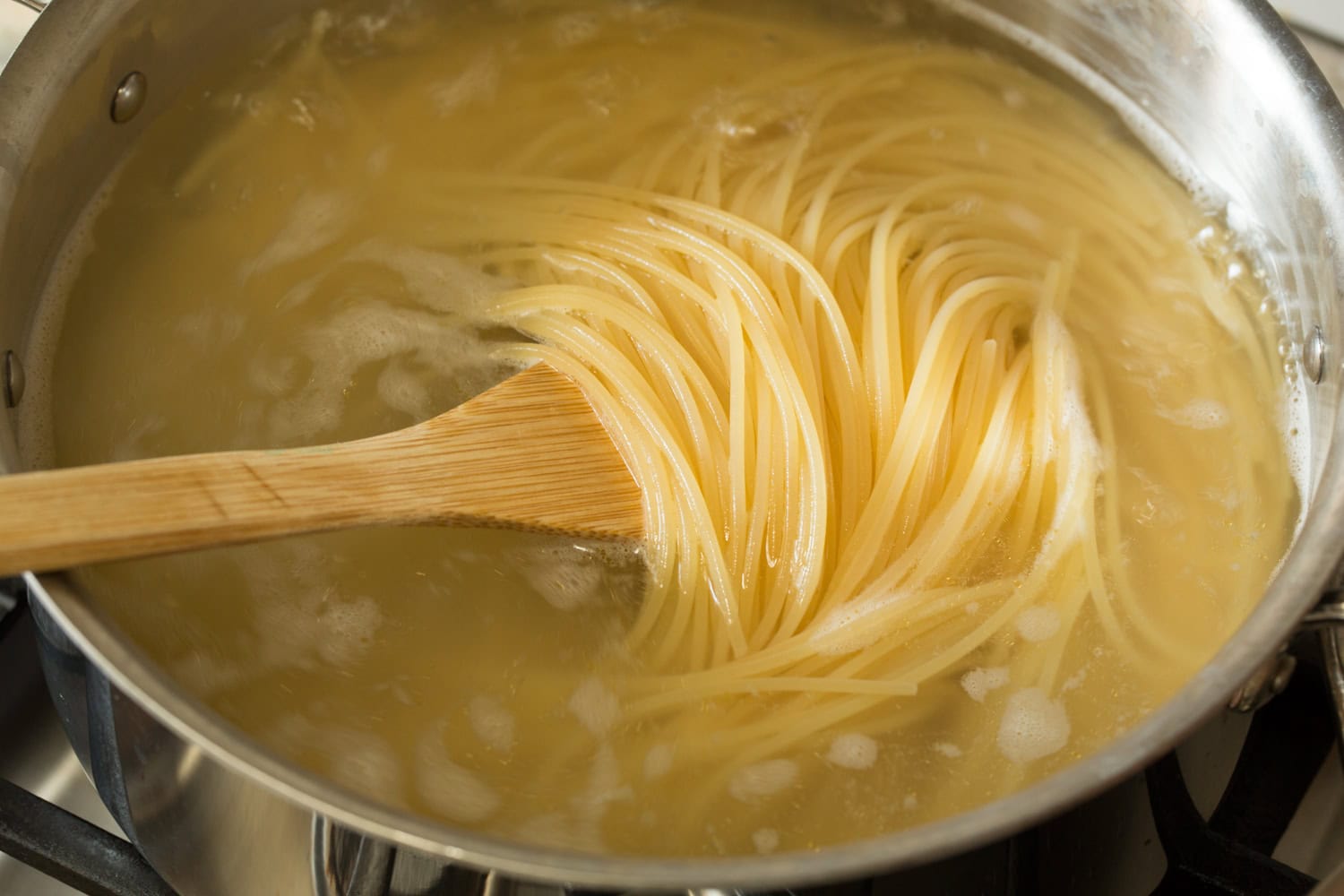 Cherry Tomato Pasta Cooked spaghetti in boiling water.