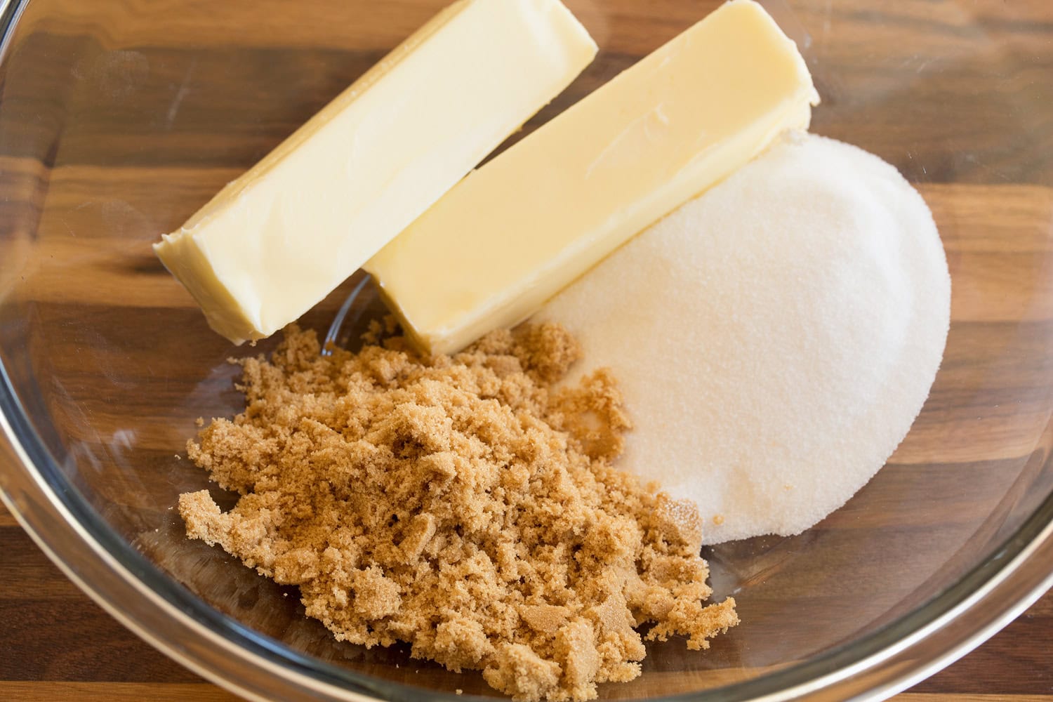 Oatmeal Cream Pies Butter and sugars in a glass mixing bowl before mixing.