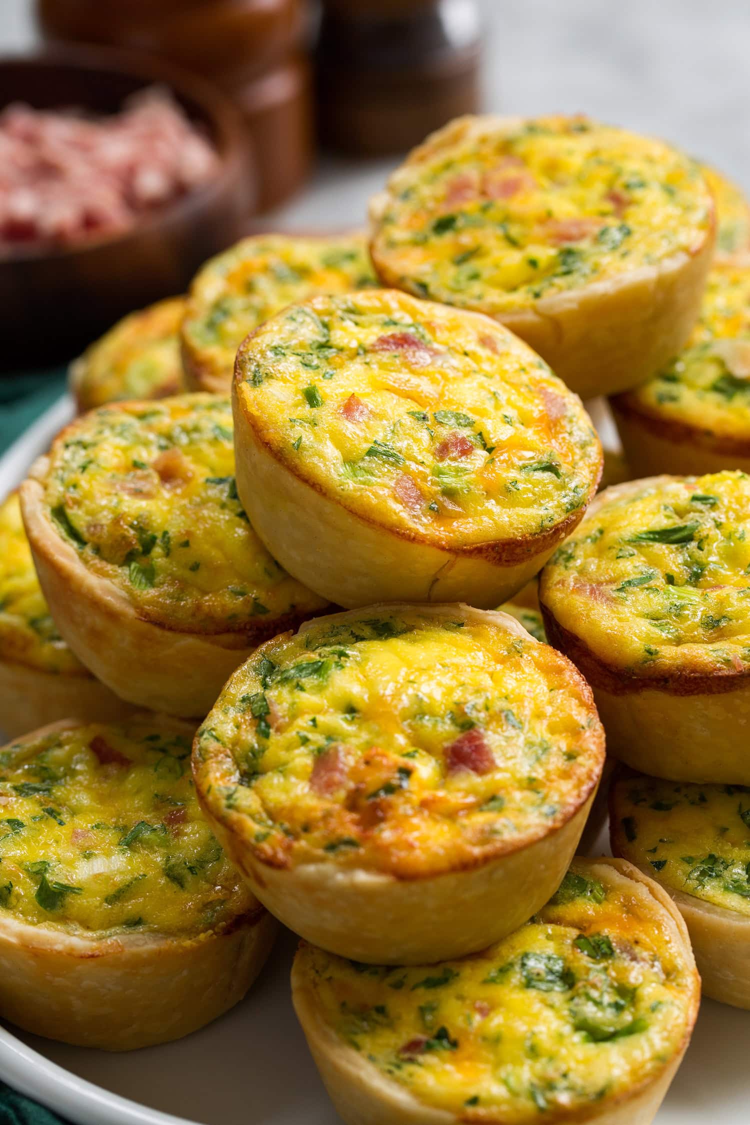 Mini Quiche Close up image of mini quiche with pie crust.