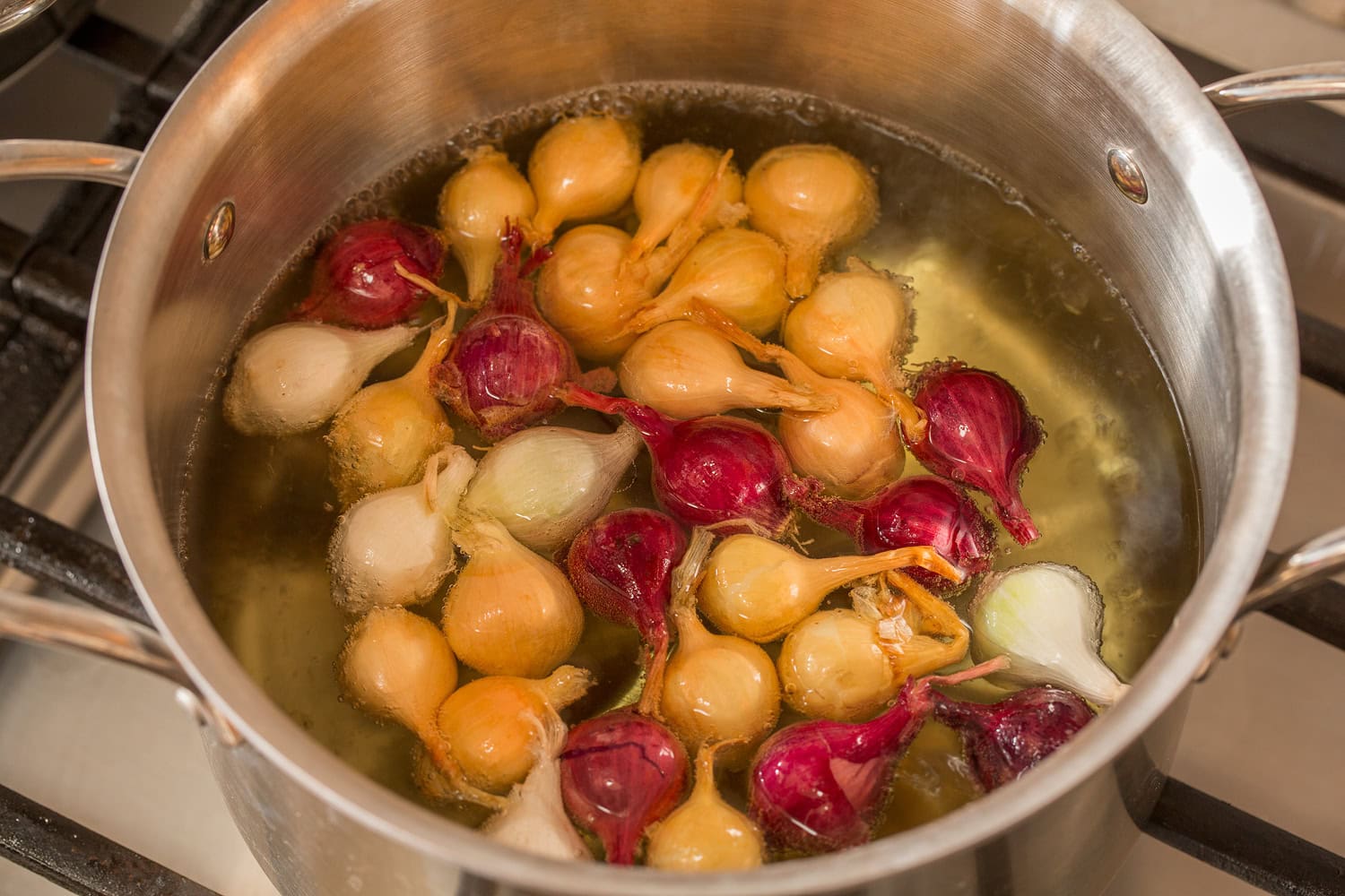 Beef Bourguignon Pearl onions boiling, done for easier peeling.
