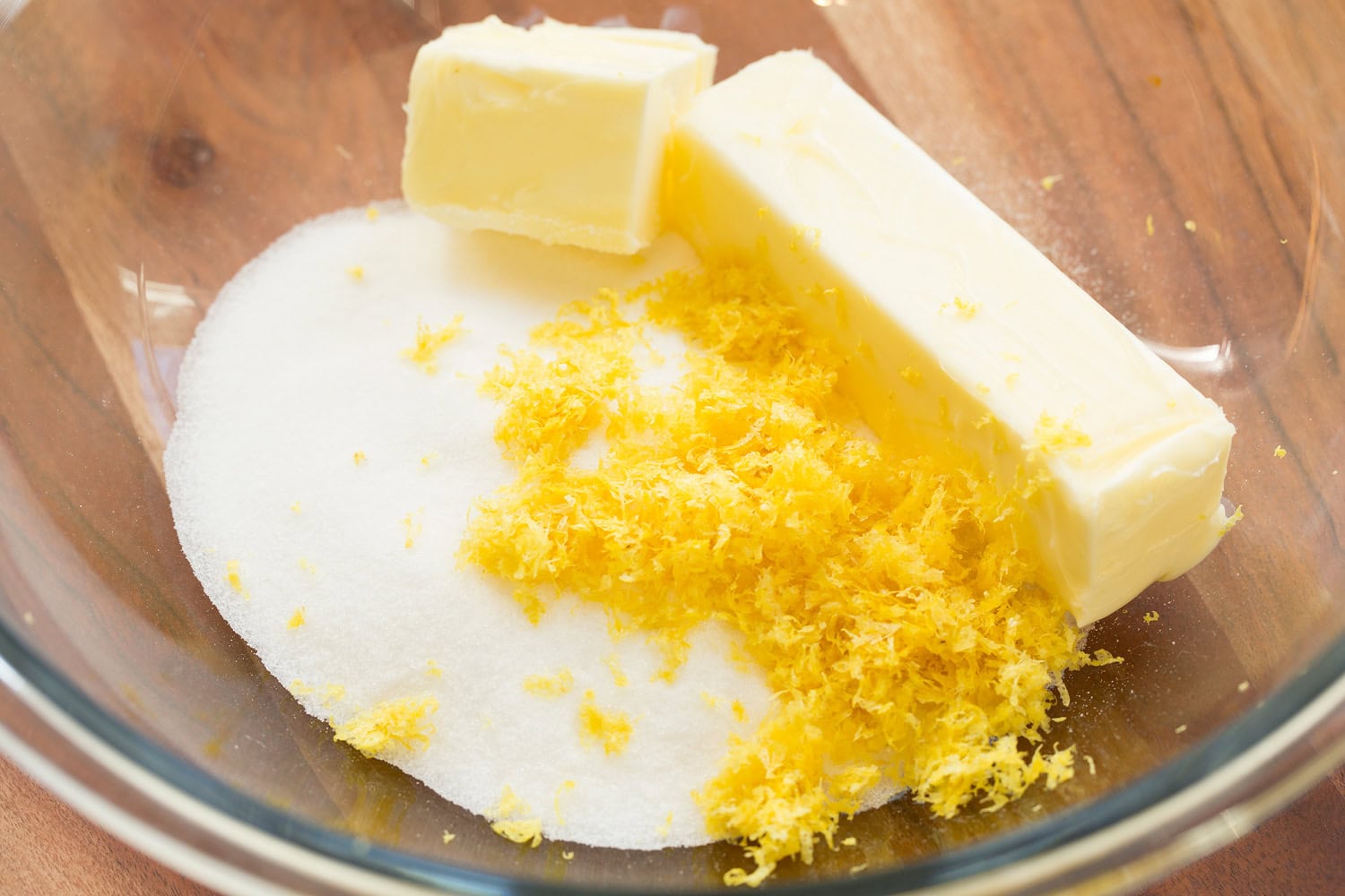 Lemon Cookies Butter, lemon zest and sugar in a mixing bowl.