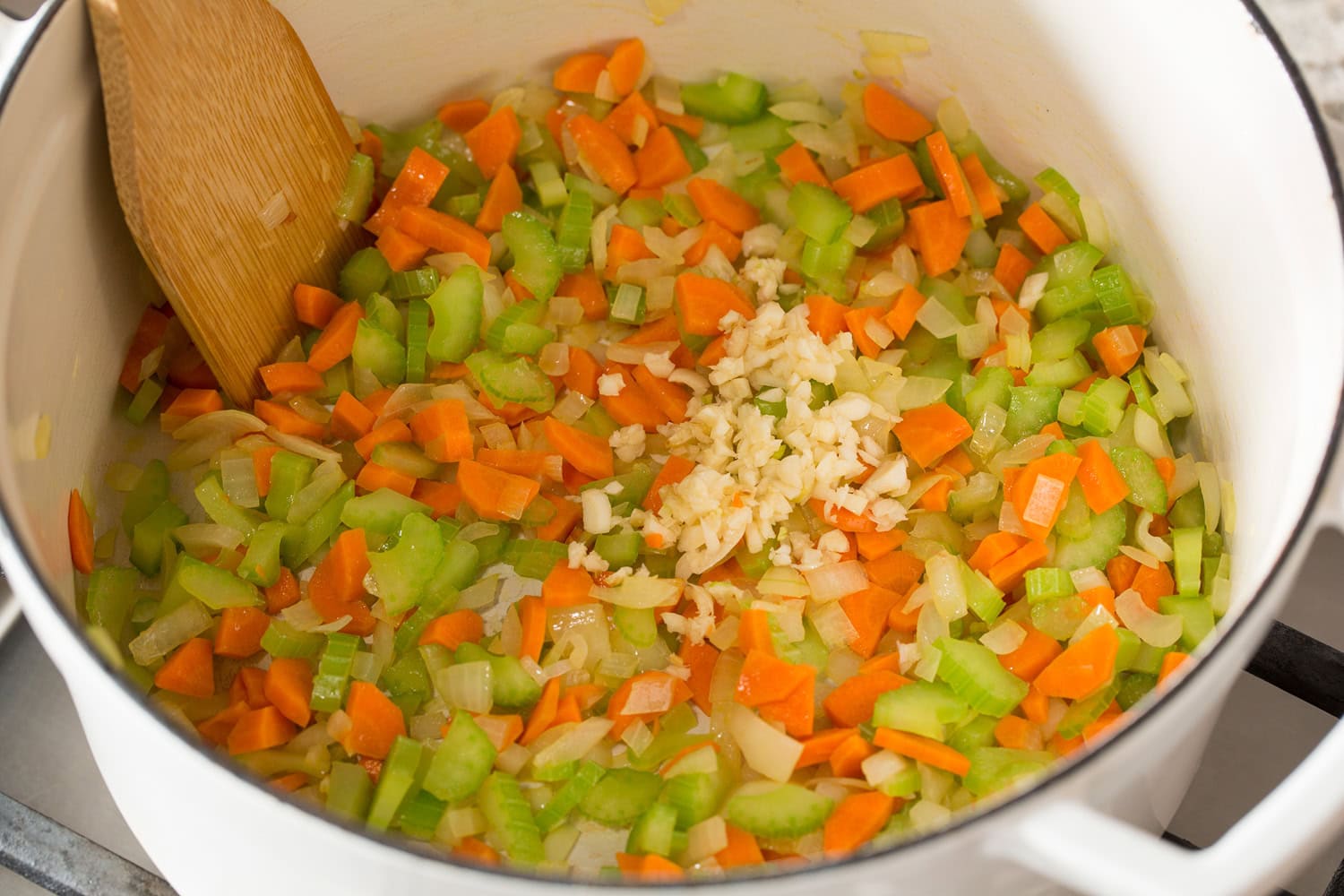 White Bean and Kale Soup Carrots, onions, celery and garlic sauteed in pot.