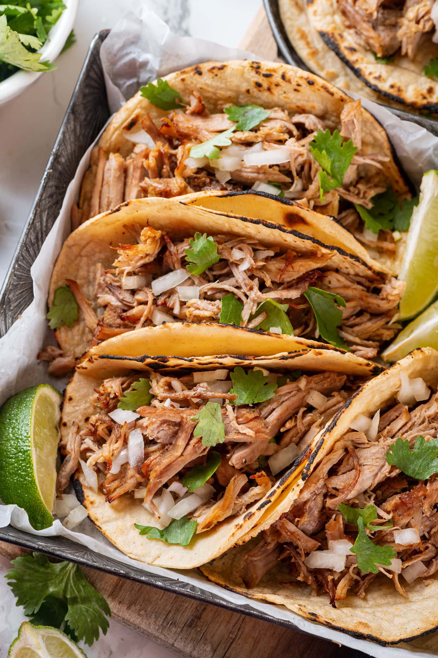Carnitas Close up photos of carnitas in tortillas.