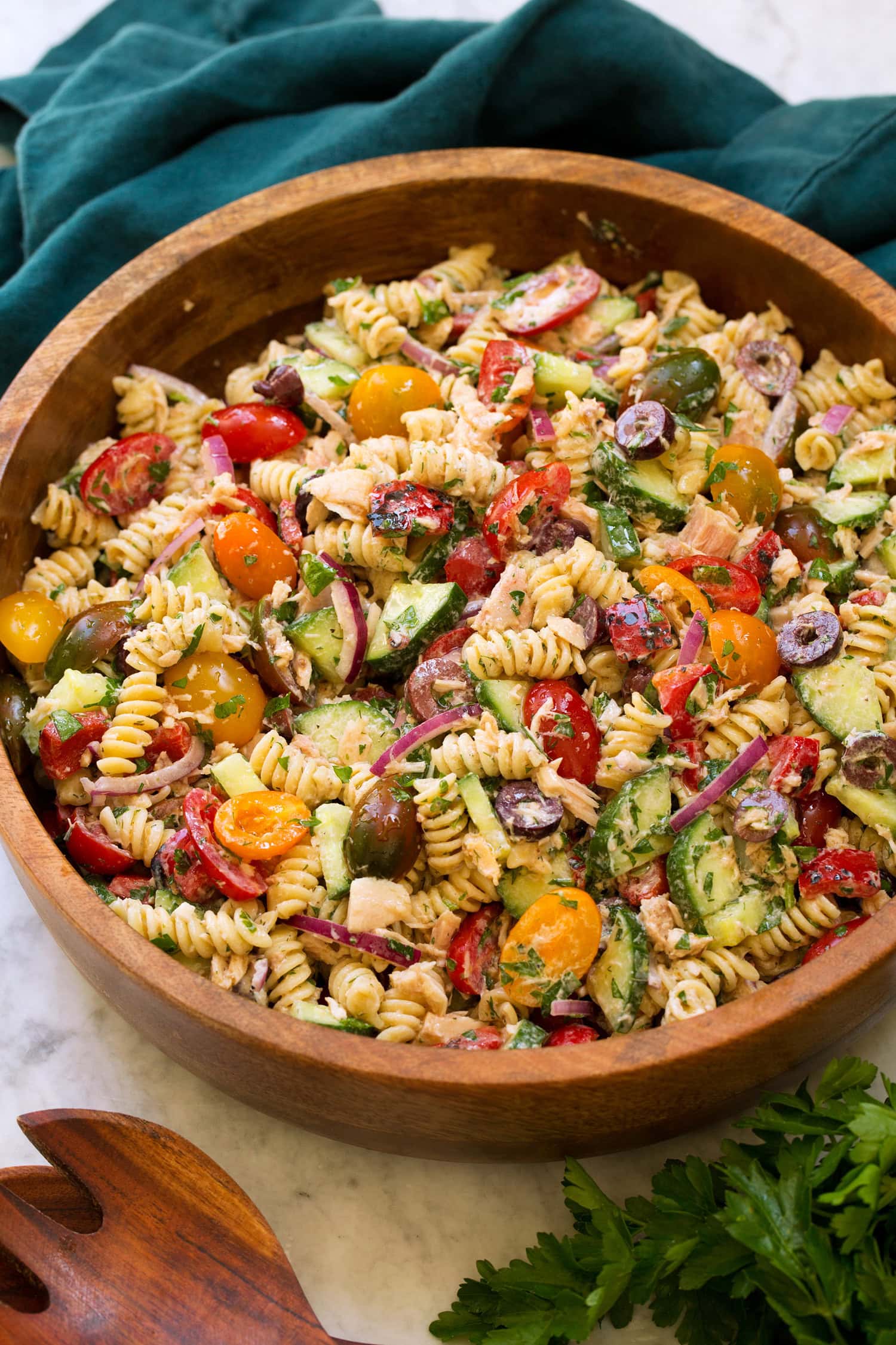 Tuna Pasta Salad Tuna pasta salad in a wooden bowl.