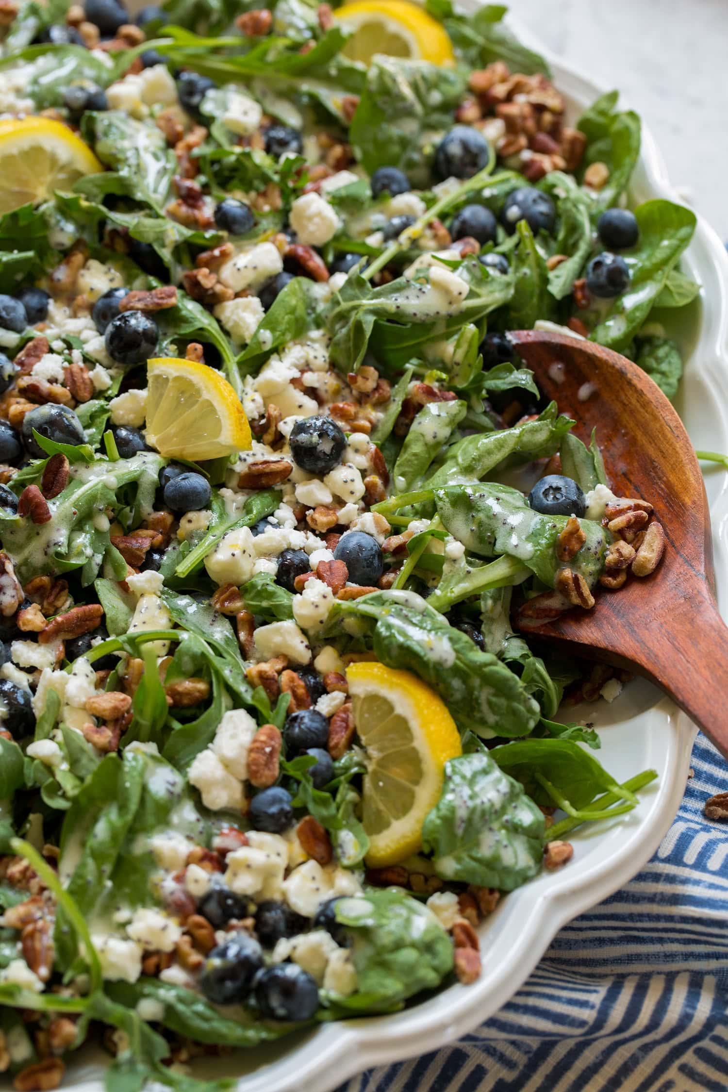 Blueberry Salad Blueberry salad with spinach, arugula, pecans, feta and lemon poppy seed dressing.